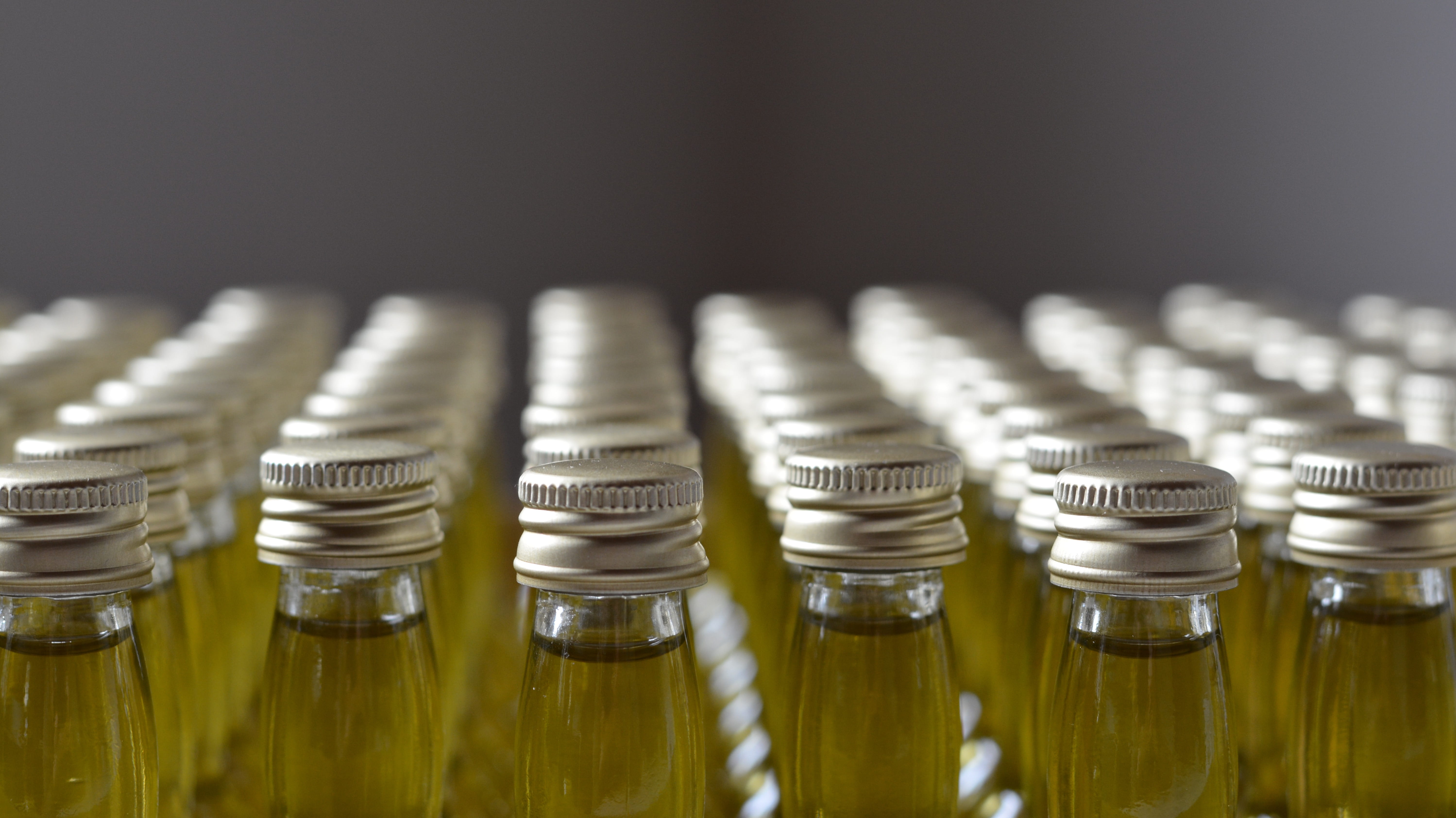 large group of objects, yellow, sunflower oil, technology, business, interior, bottles, selective focus, food and drink, close-up, oil, gold colored, music, HD Wallpaper