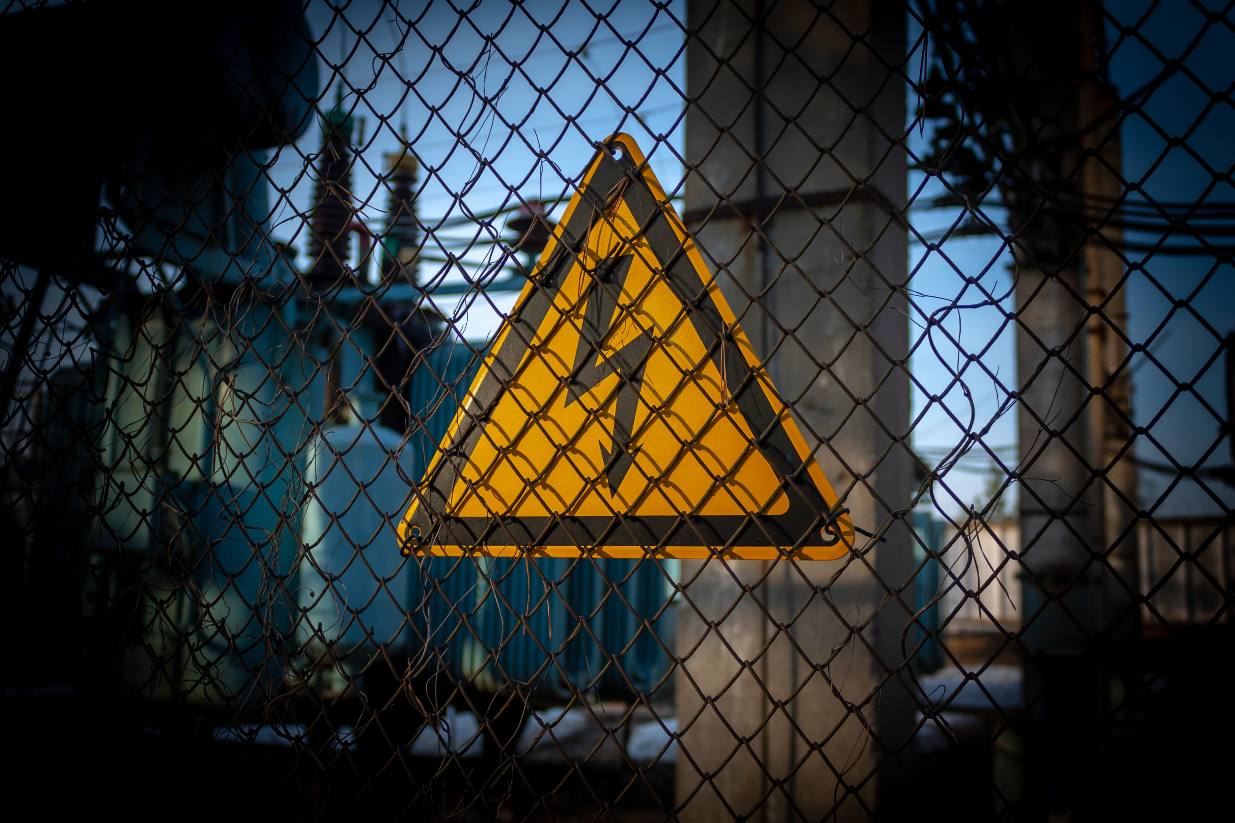 sign, yellow, boundary, metal, the risk of, built structure, nature, warning sign, outdoors, electricity, focus on foreground, forbidden, high voltage, HD Wallpaper