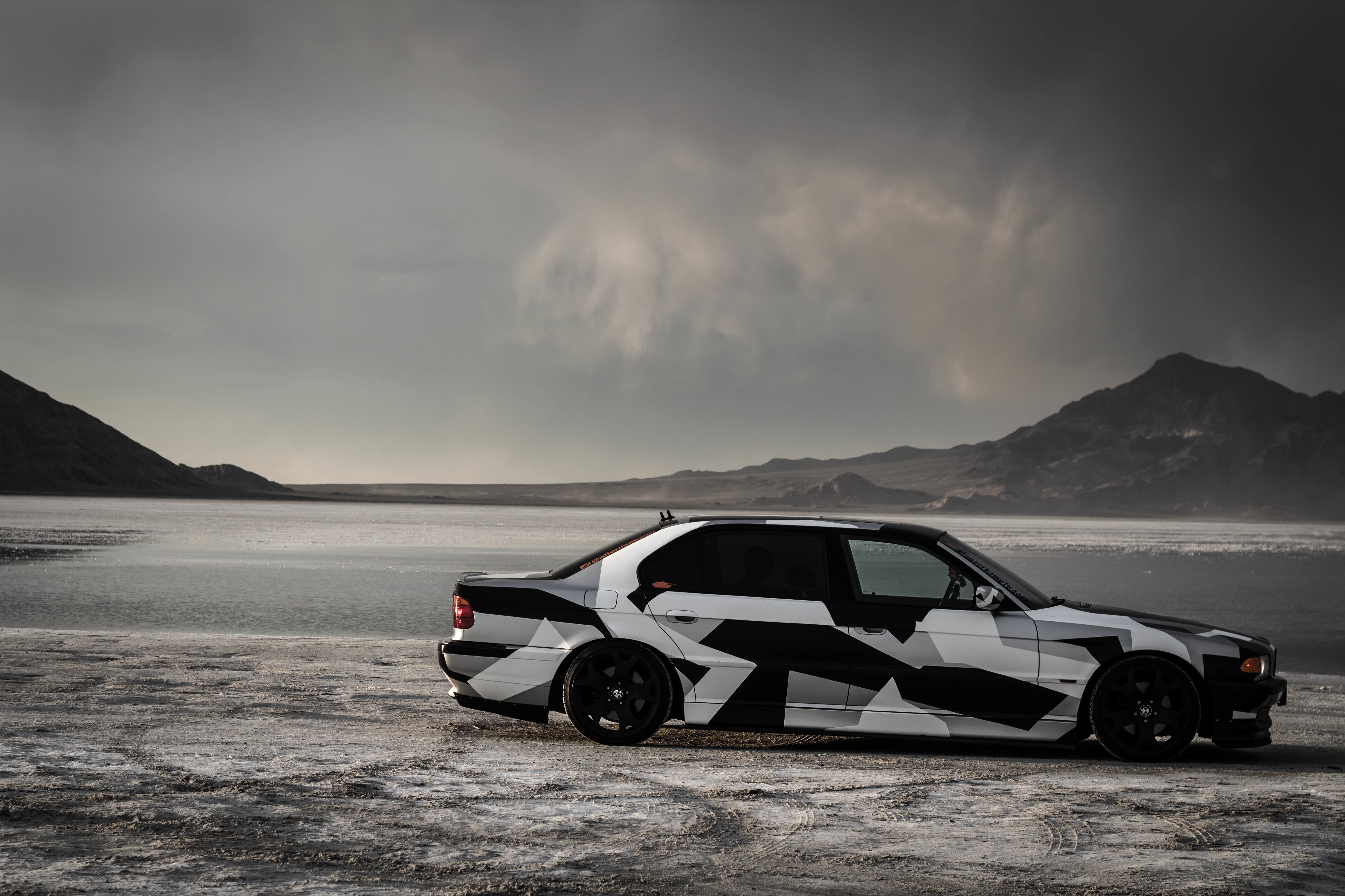 mode of transportation, 5K, transportation, sedan, camouflage, non-urban scene, black, mountain range, beauty in nature, BMW, gray, motor vehicle, nature, HD Wallpaper