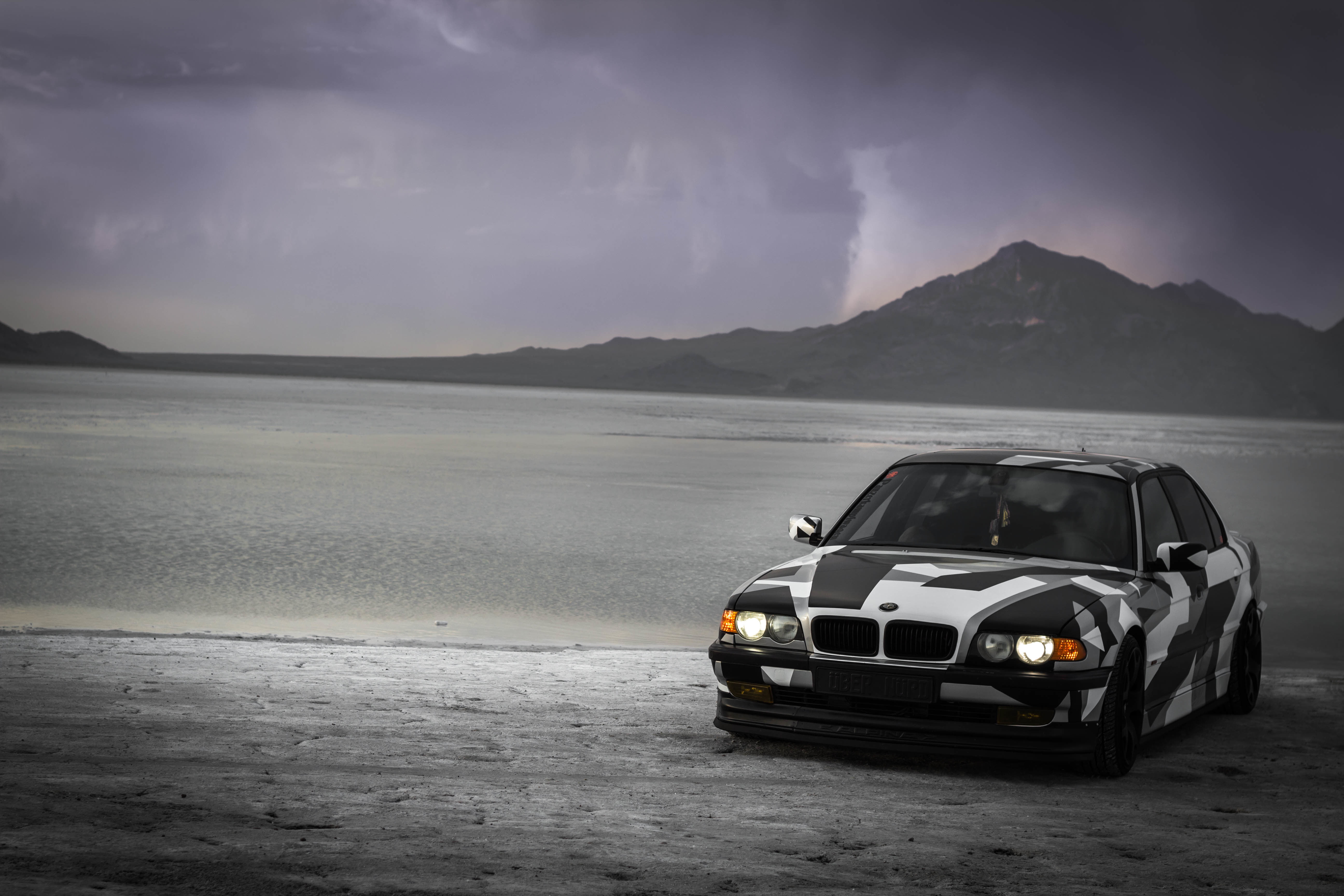 sand, 740il, land vehicle, non-urban scene, 5K, E38, sky, motor vehicle, Alpina, car, outdoors, sea, nature, camo, BMW, water, beauty in nature, road trip, HD Wallpaper
