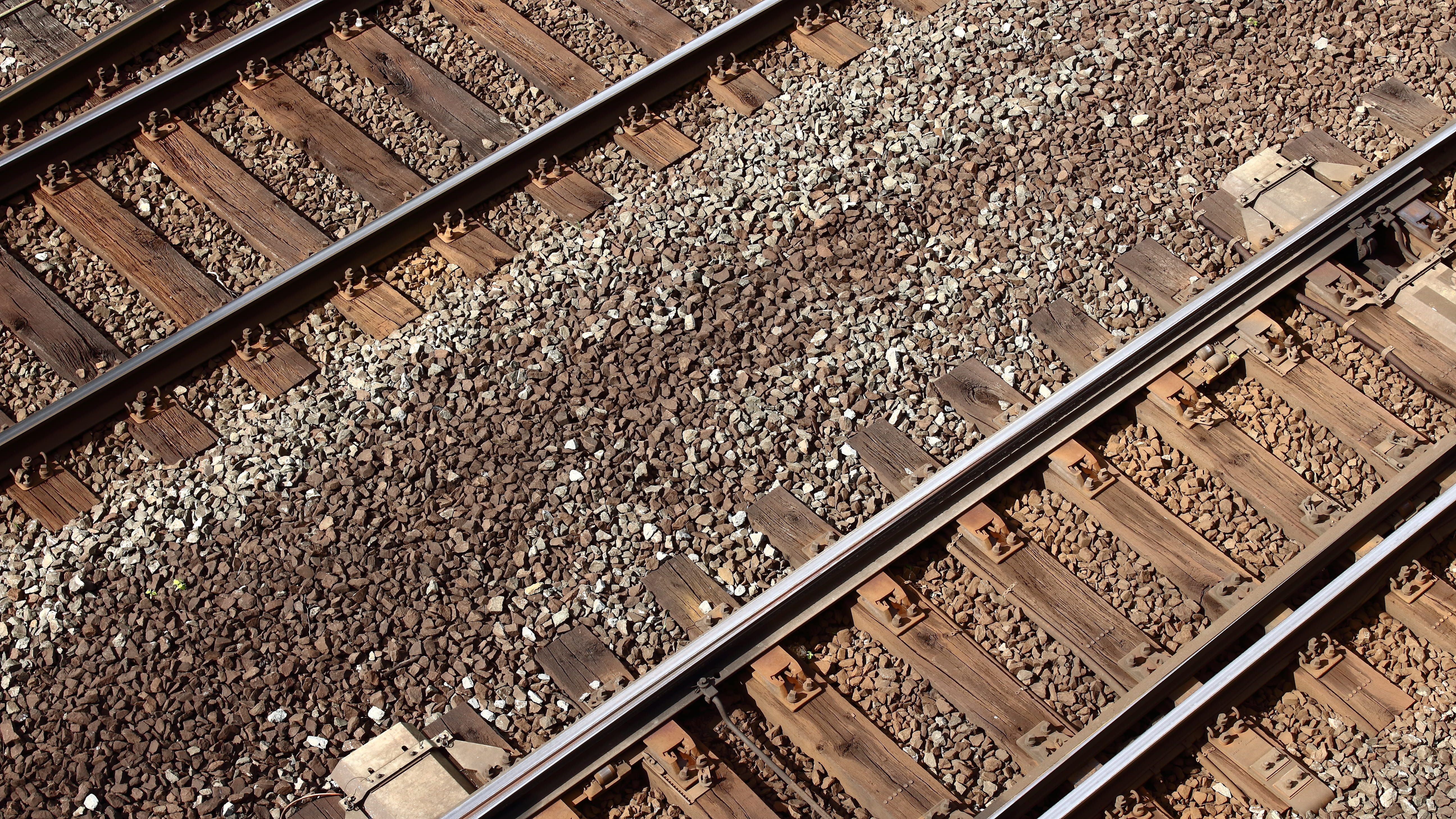 pattern, junction, stone - object, traffic, railway tracks, Train, outdoors, iron - metal, text, mode of transportation, sunlight, no people, industry, HD Wallpaper