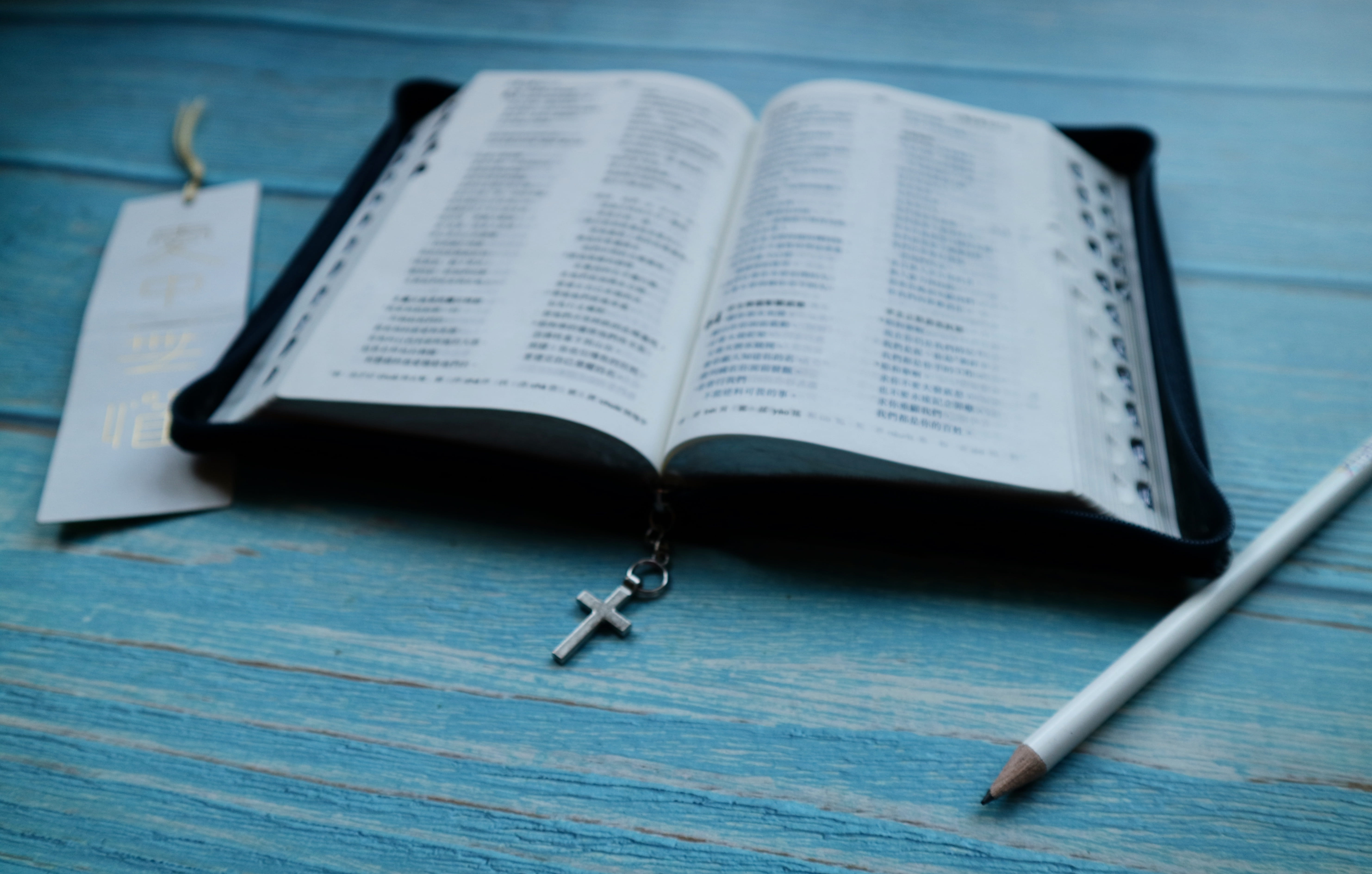 music, table, page, selective focus, focus on foreground, single object, no people, communication, 5K, two objects, blue, holy bible, still life, book, HD Wallpaper