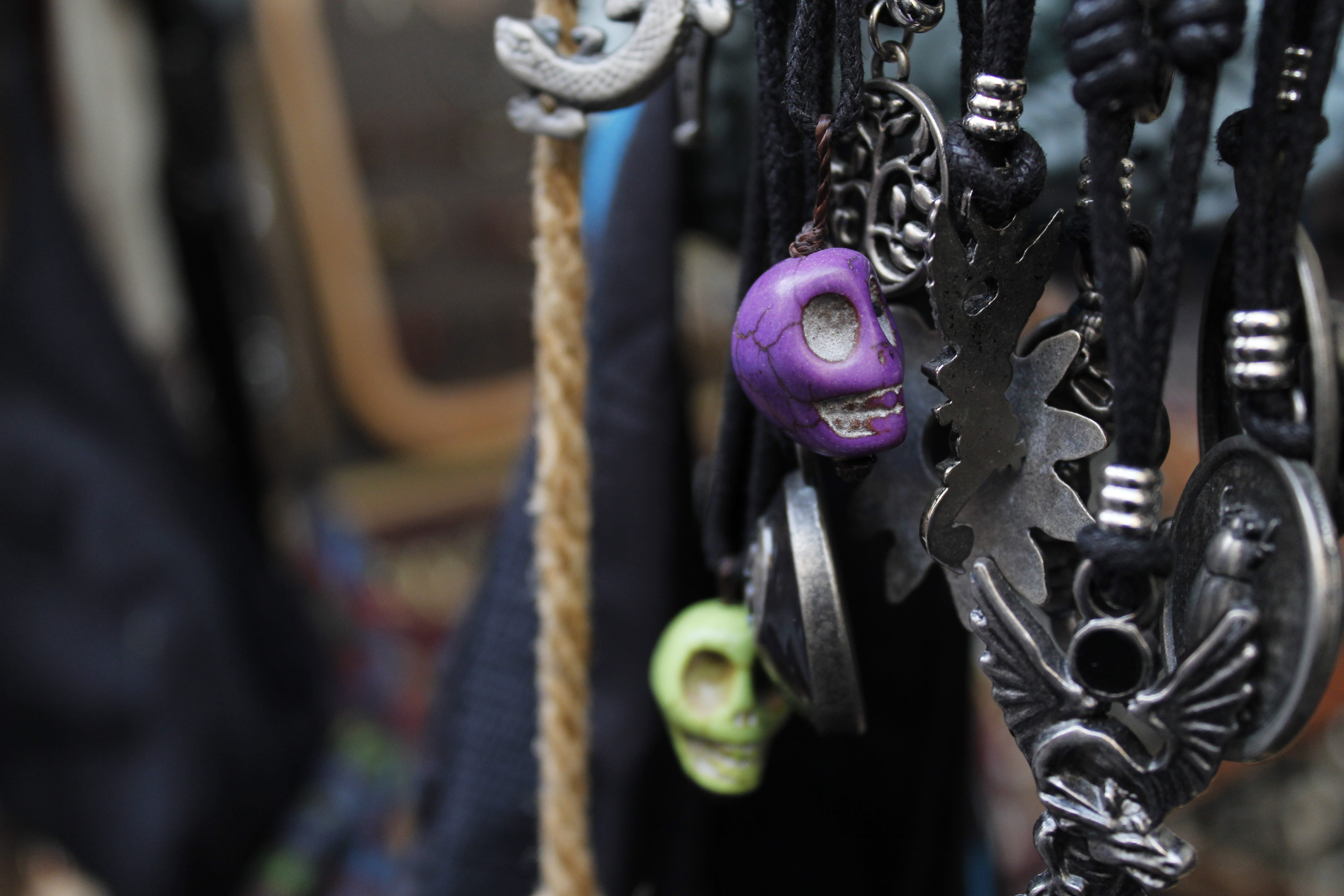 medieval, selective focus, symbols, metal, craft, no people, spain, creativity, mystical, hanging, wheel, market, jewellery, close-up, in a row, skull, HD Wallpaper