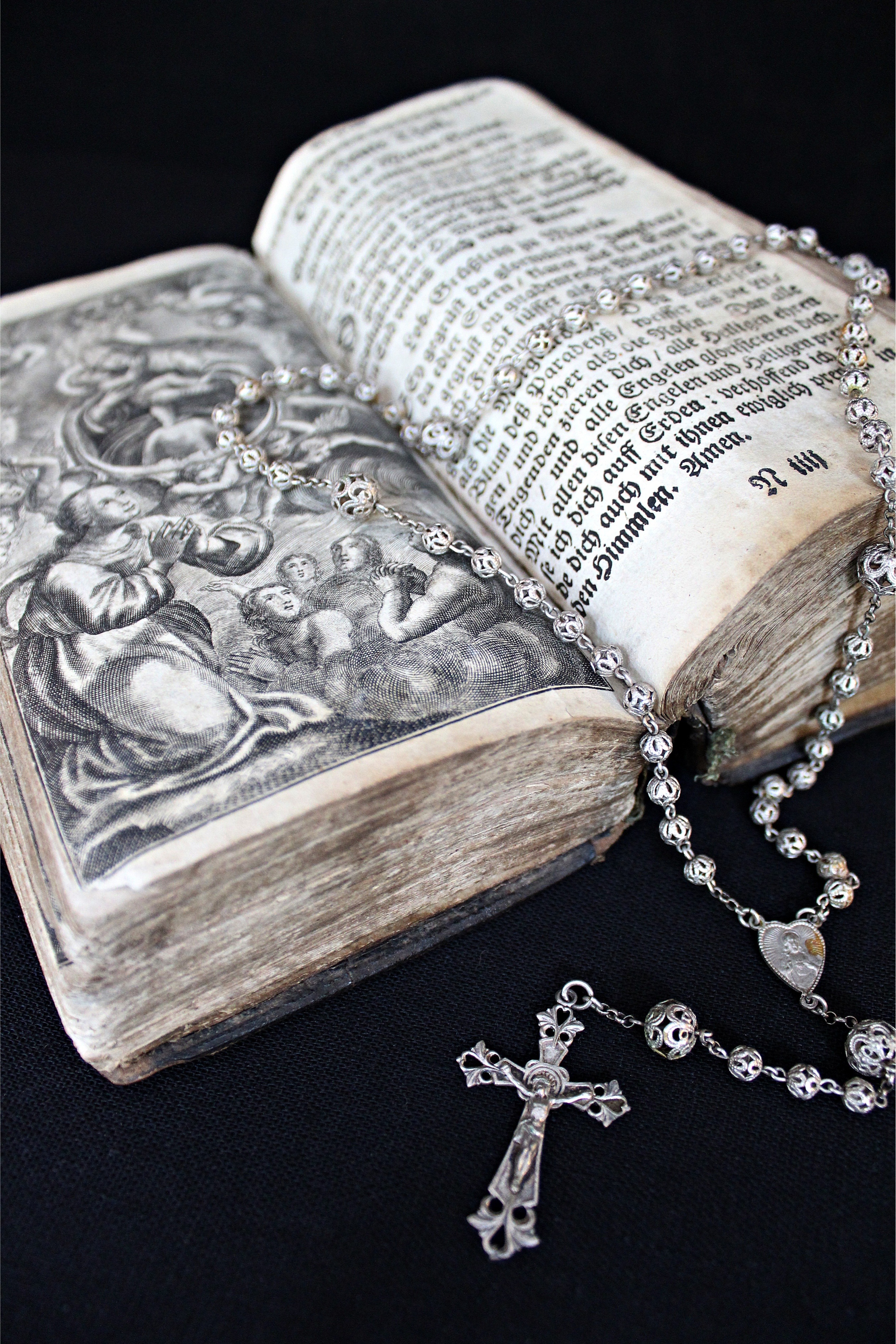 publication, still life, christianity, religion, diamond - gemstone, black color, book, book pages, silver colored, necklace, church, no people, close-up, Phone HD Wallpaper