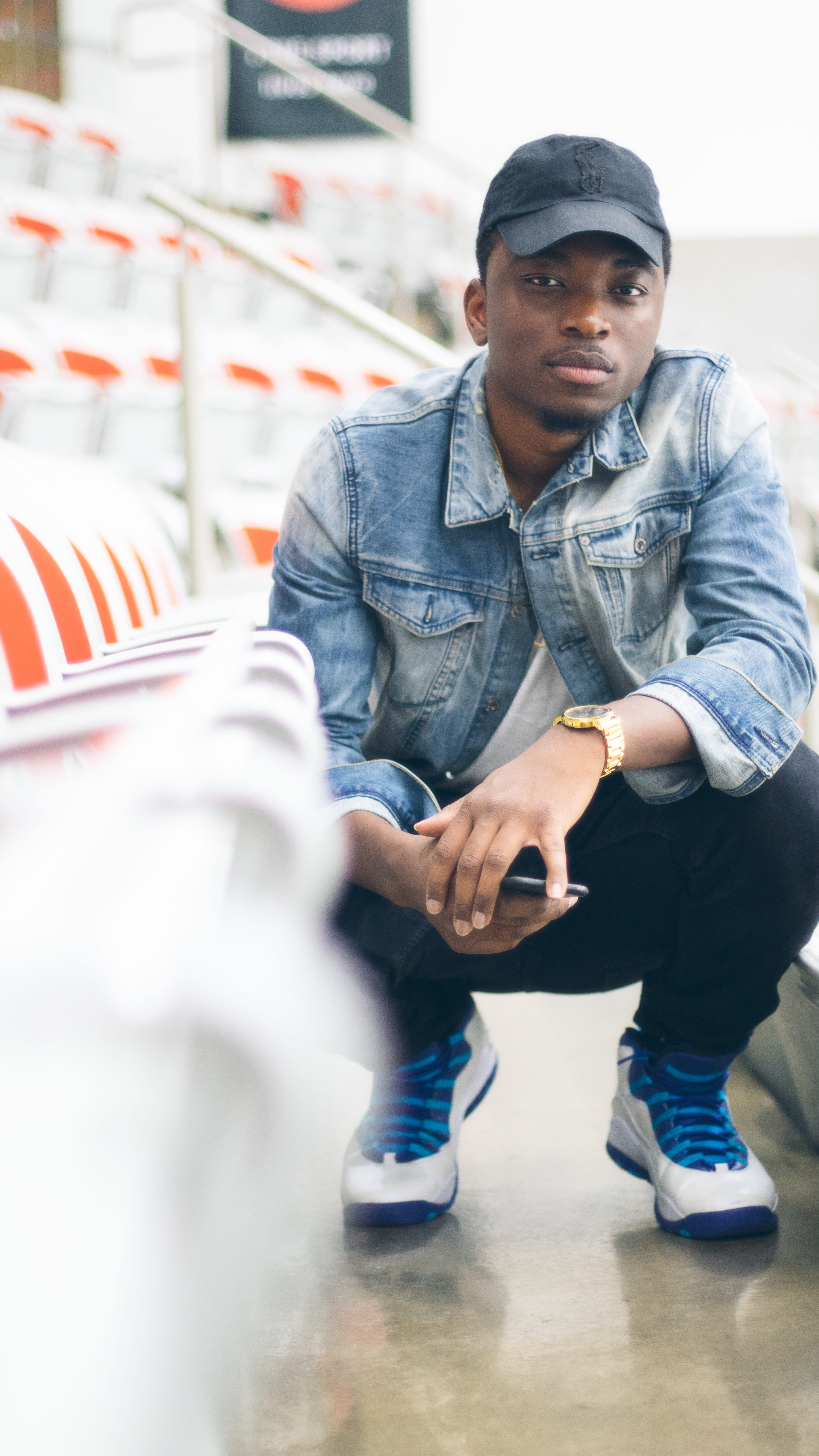 crouching, people, adult, males, footwear, canada, human, looking, lifestyles, young men, leisure activities, calgary, colour, day, cap, front, factory, Phone HD Wallpaper
