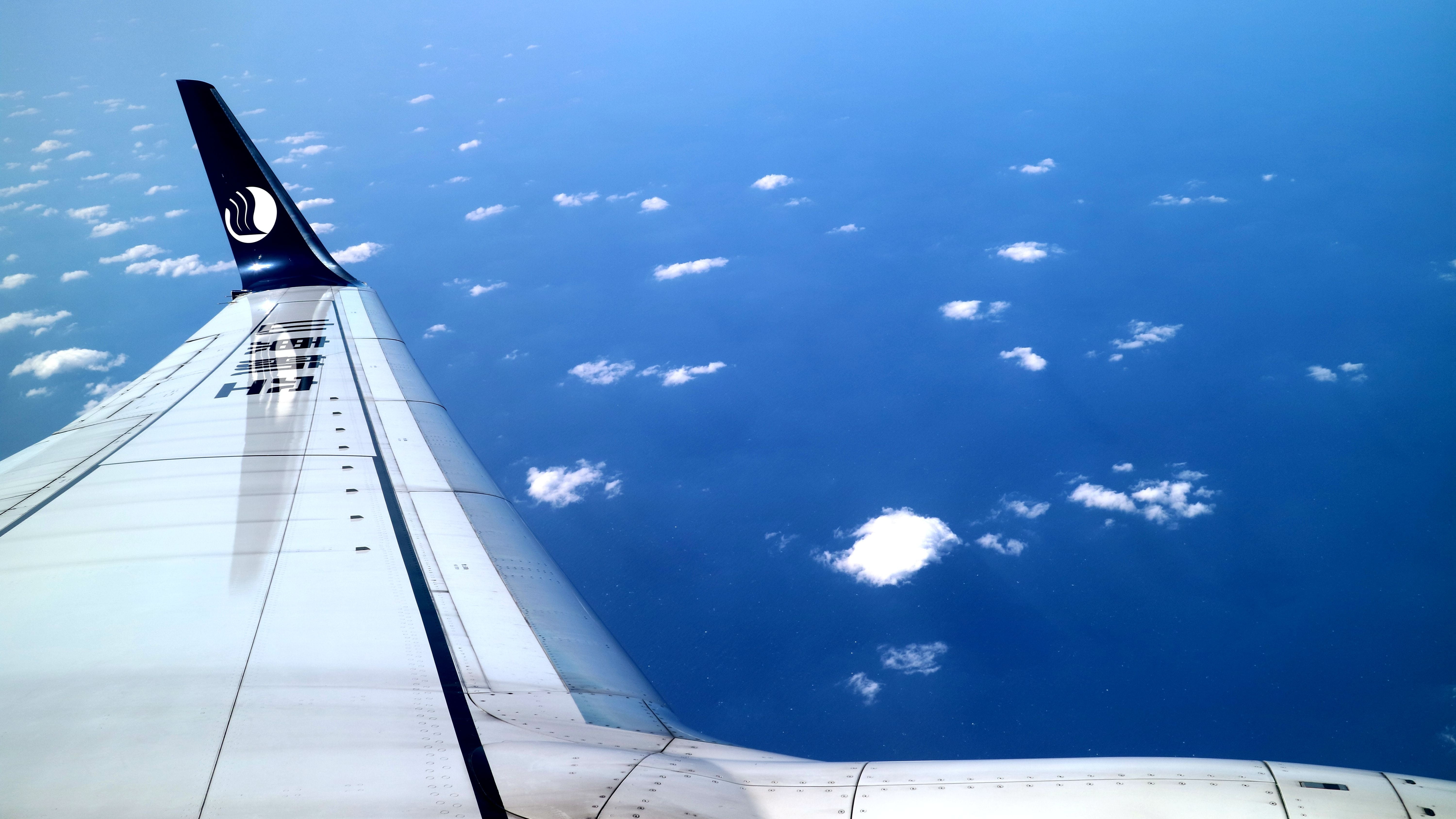cloud - sky, air vehicle, sunny, above, environment, clouds, 5K, wind, outer space, flight, travel, landscape, aircraft wing, atmosphere, sky, day, mode of transportation, HD Wallpaper