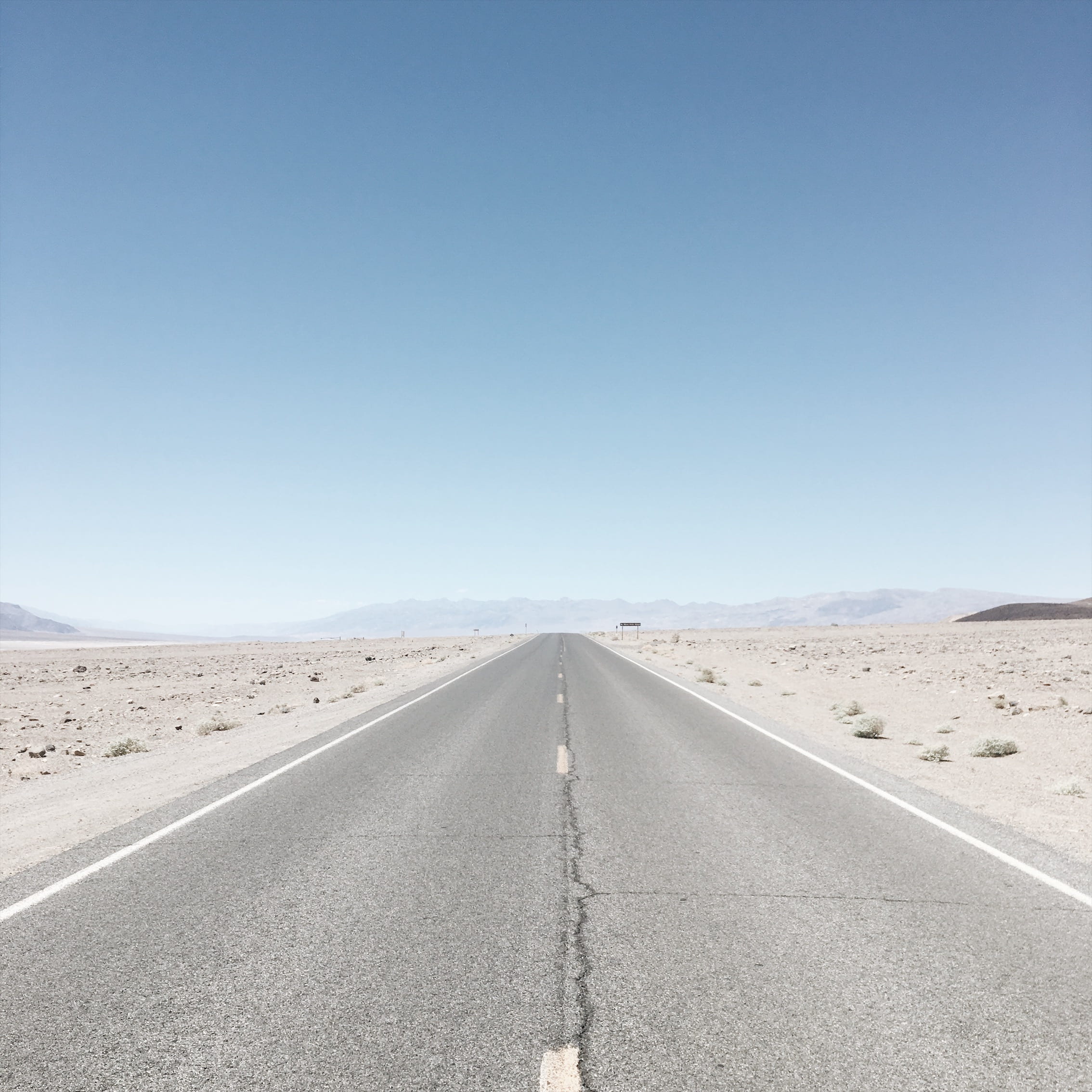 concrete, transportation, nevada, nature, diminishing perspective, journey, desert, californium, land, straight, sky, road marking, symmetry, the way forward, Phone HD Wallpaper