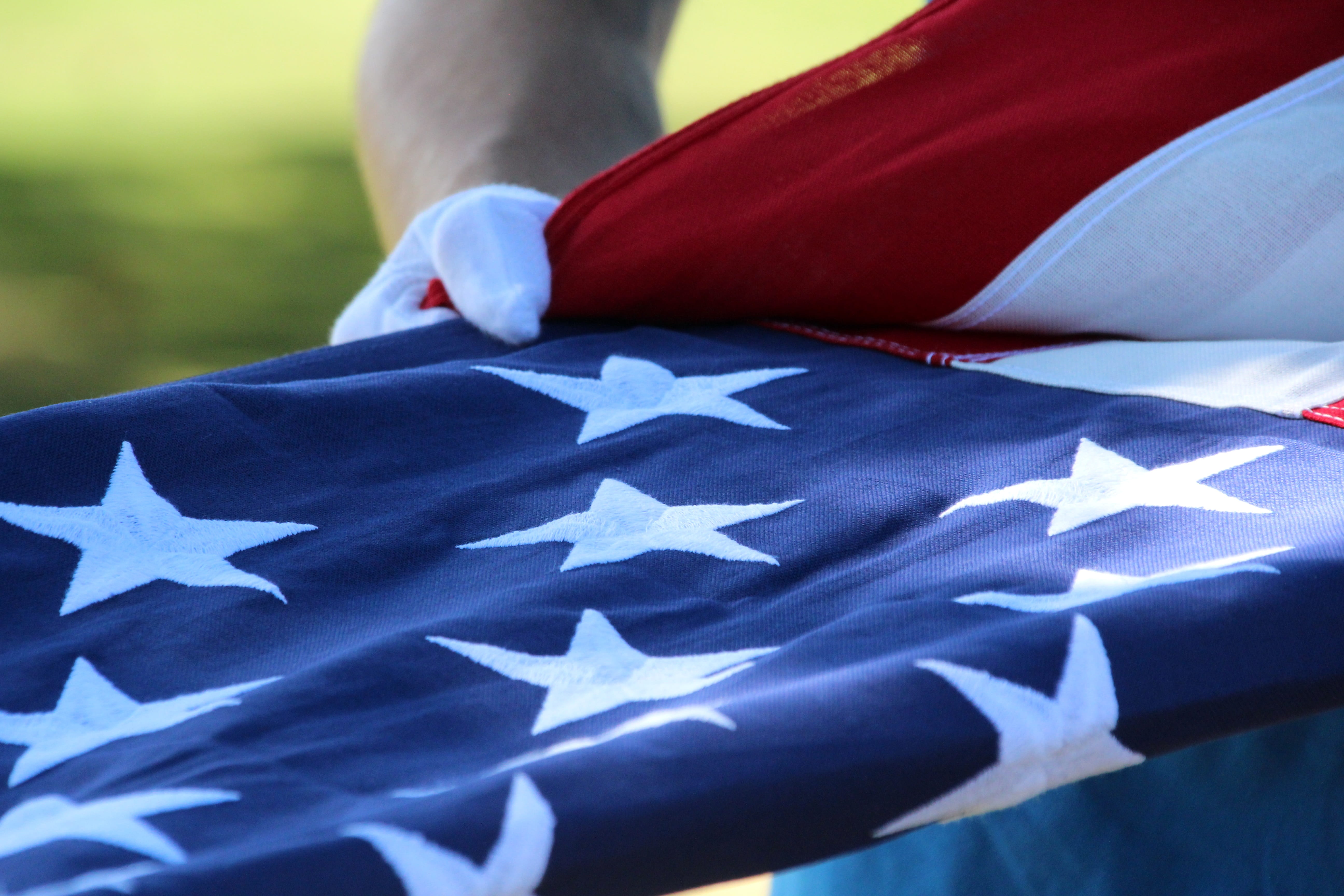 people, star shape, flag, outdoors, celebration, human body part, military funeral, symbol, 5K, focus on foreground, event, folded, blue, usa flag, close-up, HD Wallpaper