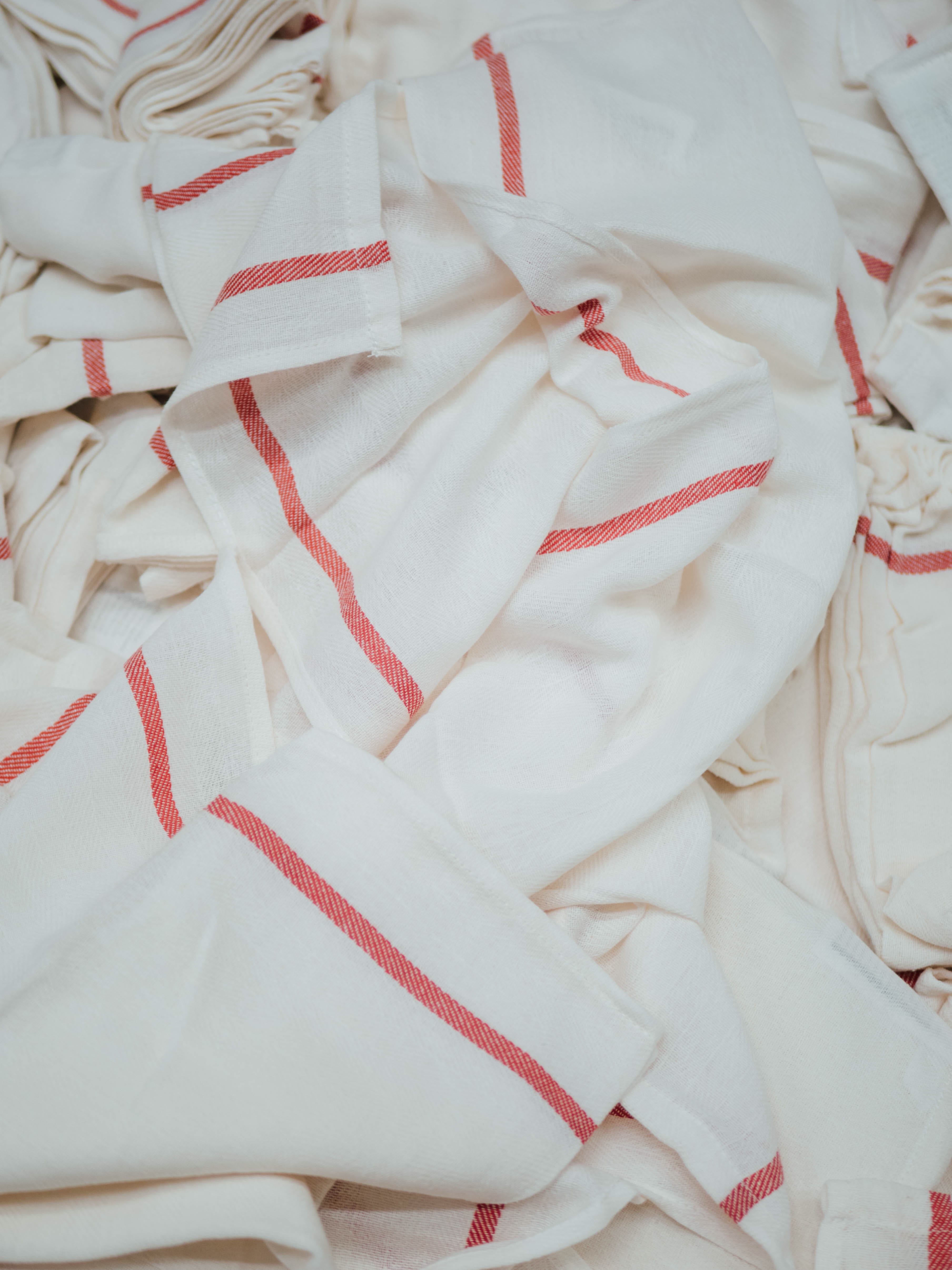 textiles, embroidery, bed, still life, red, indoors, floral pattern, textile, ribbon, white, pattern, full frame, clothing, material, close-up, backgrounds, Phone HD Wallpaper
