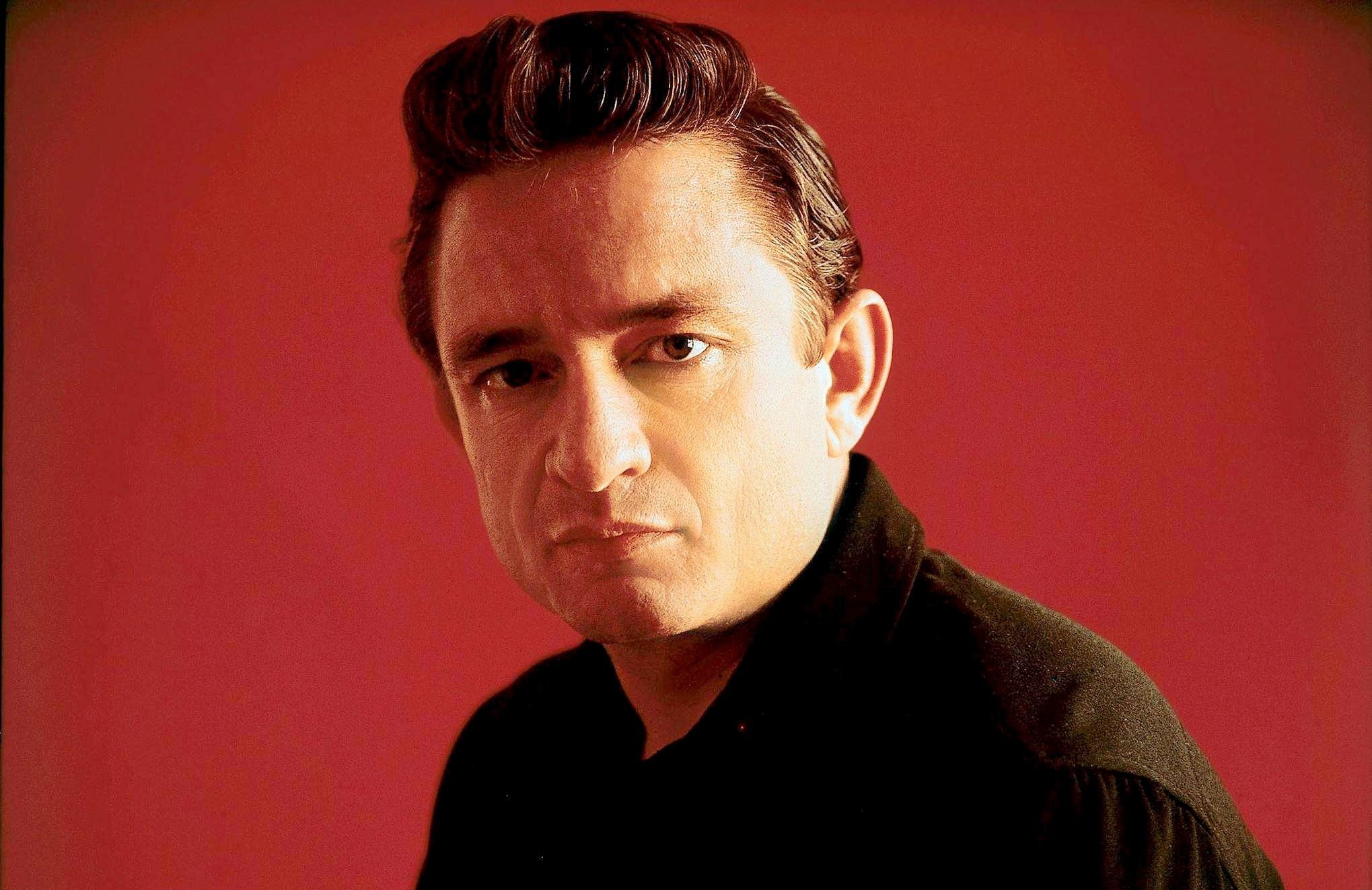 colored background, studio shot, lifestyles, serious, human face, one person, simple background, wall - building feature, indoors, adult, Johnny Cash, black color, HD Wallpaper