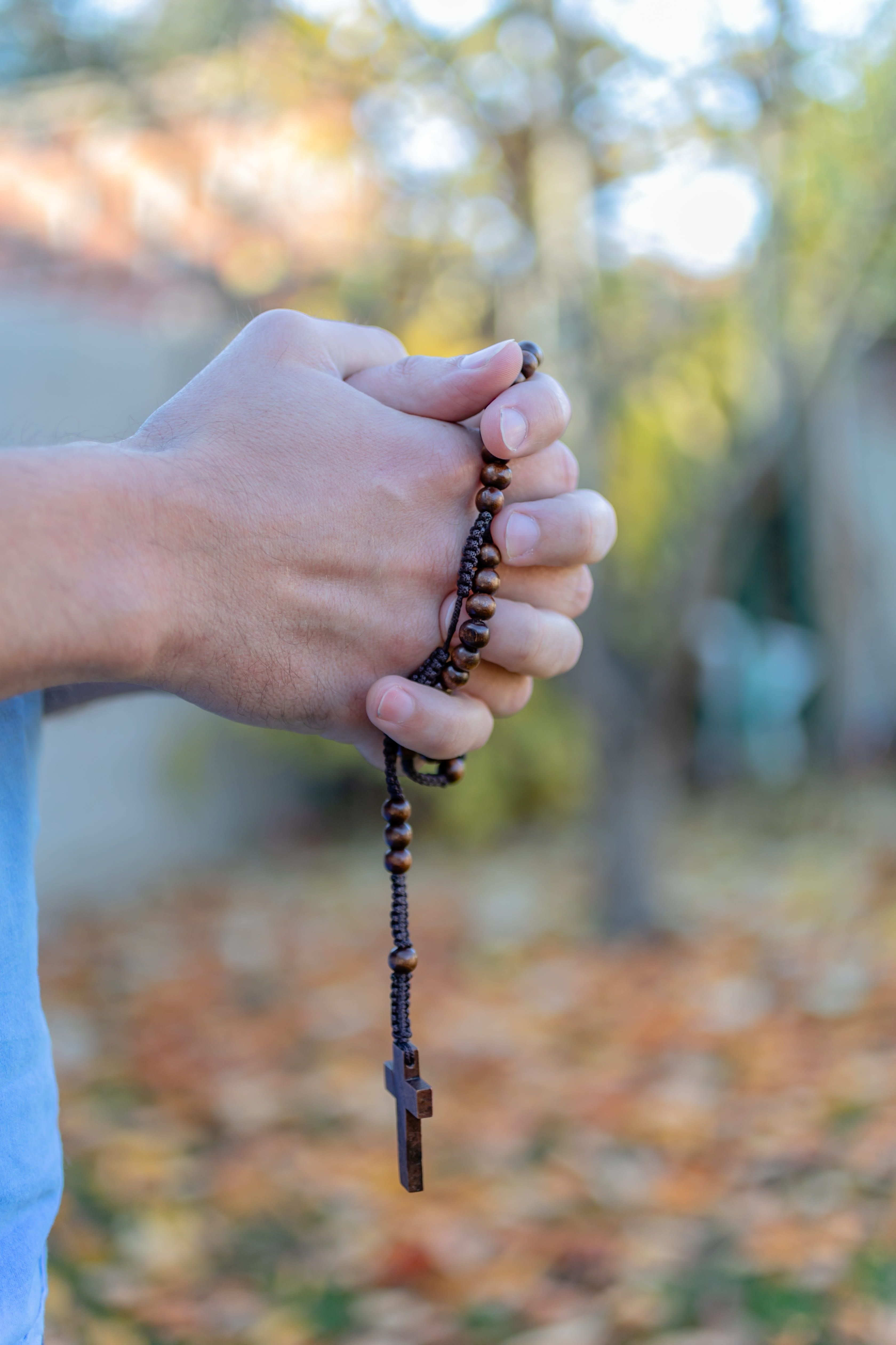 christ, sacrament, religion, catholic, nature, one person, close-up, focus on foreground, hand, unrecognizable person, rosary, jesus, real people, human hand, Phone HD Wallpaper
