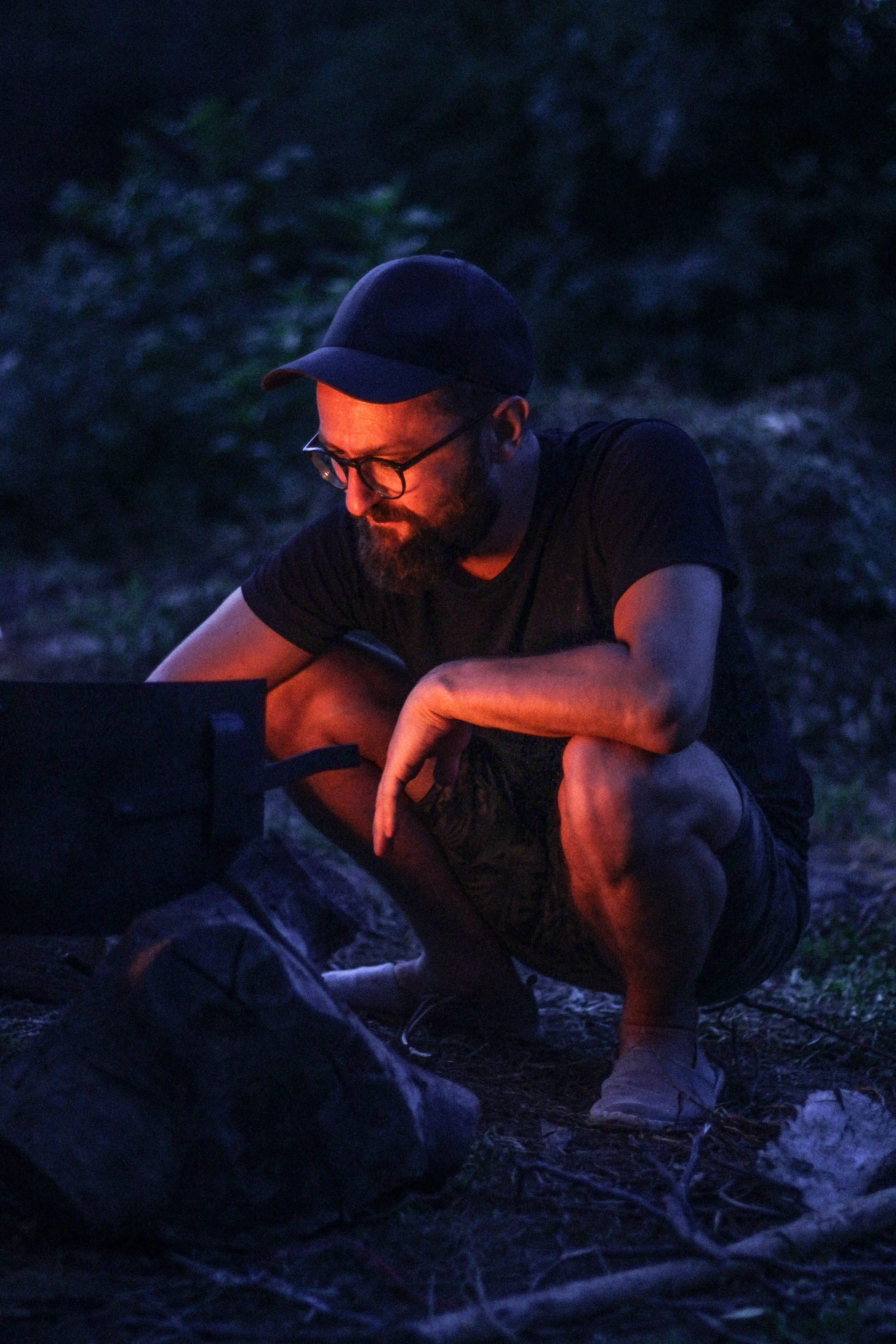 sitting by the fire, bag, moody, beard, solid, summer mood, leisure activity, human, blue, man, rock - object, teenager, land, healthy, young men, full length, Phone HD Wallpaper