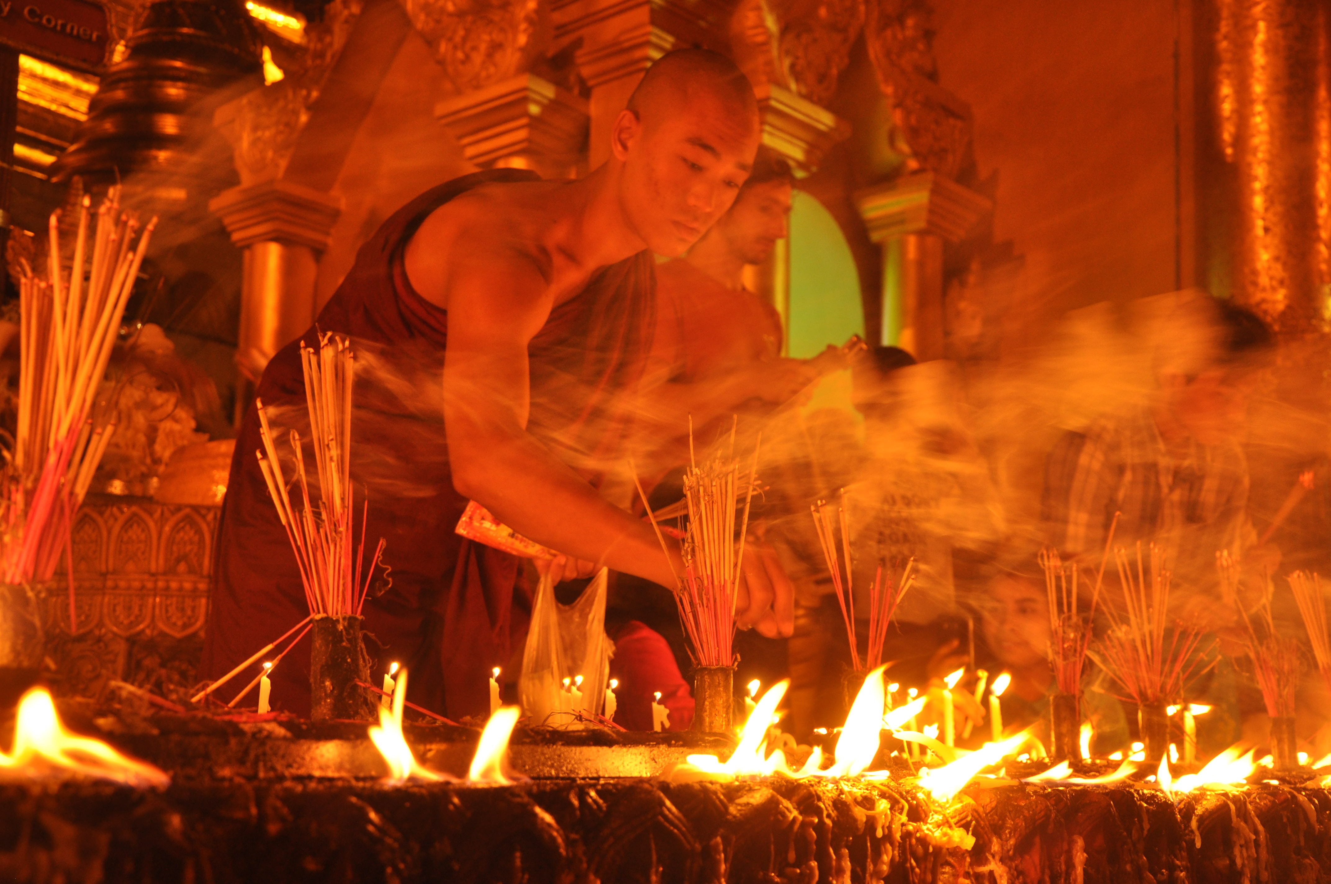 adult, candle, flame, fire - natural phenomenon, buddhist, light festival, Myanmar, full length, motion, indoors, industry, people, real people, wood - material, HD Wallpaper