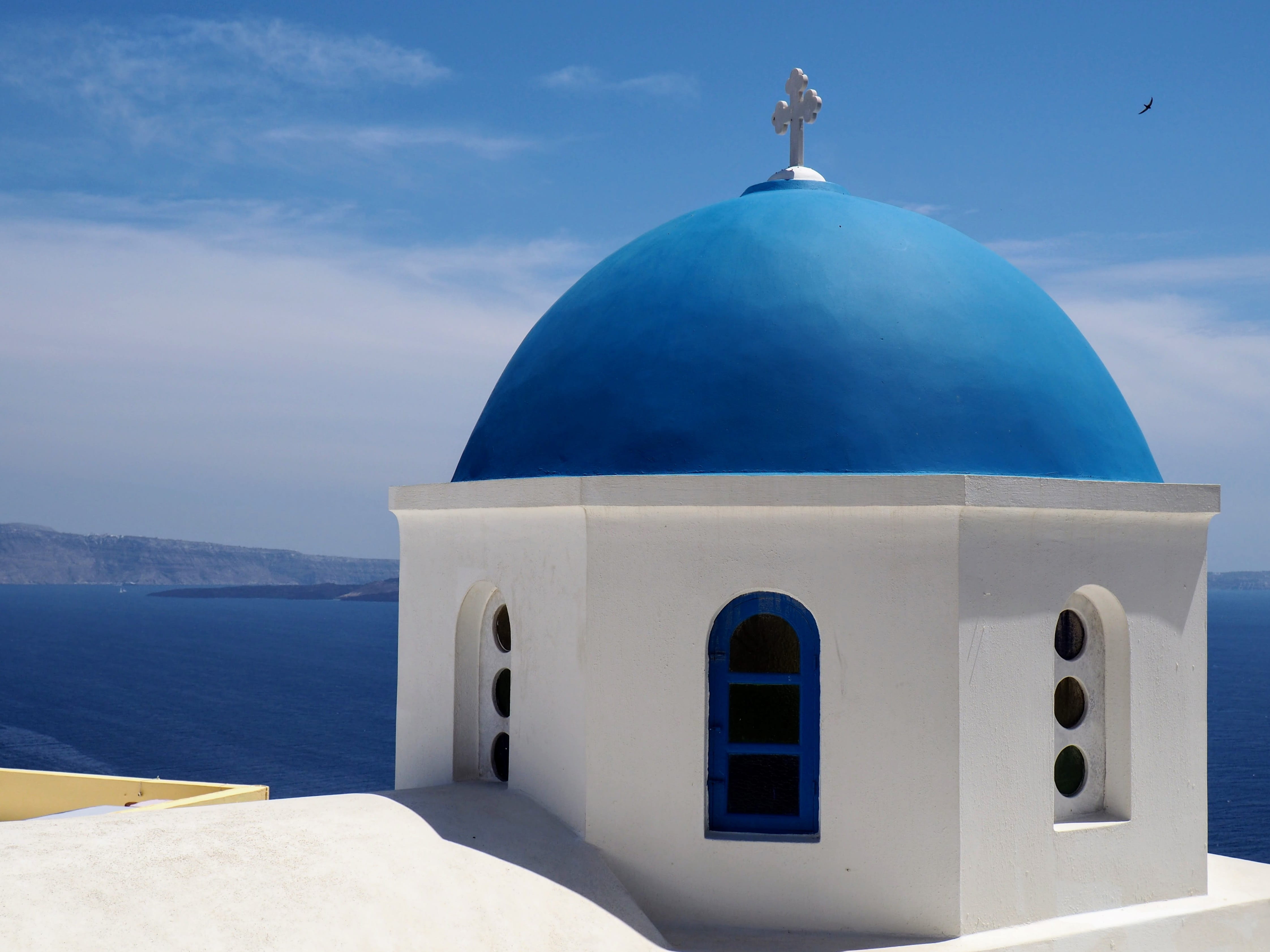 Greece, white, 4K, day, ocean, spirituality, mediterranean sea, orthodox church, church, religion, daytime, building exterior, outdoors, sky, white color, HD Wallpaper