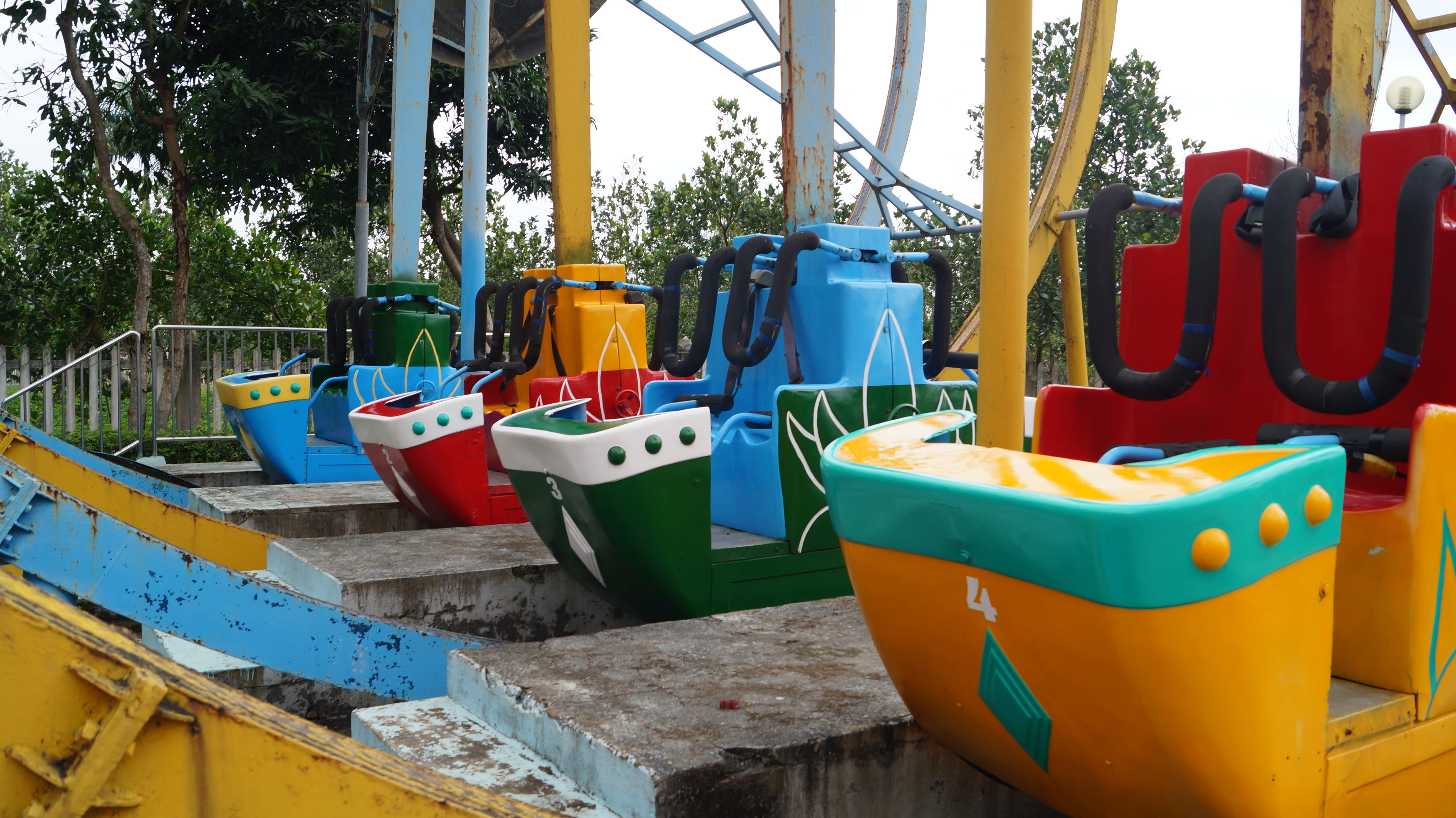 roller coaster, water, yellow, 5K, vinh, multi colored, abandoned thins, old items, transportation, tree, amusement park, blue, theme park, mode of transportation, HD Wallpaper