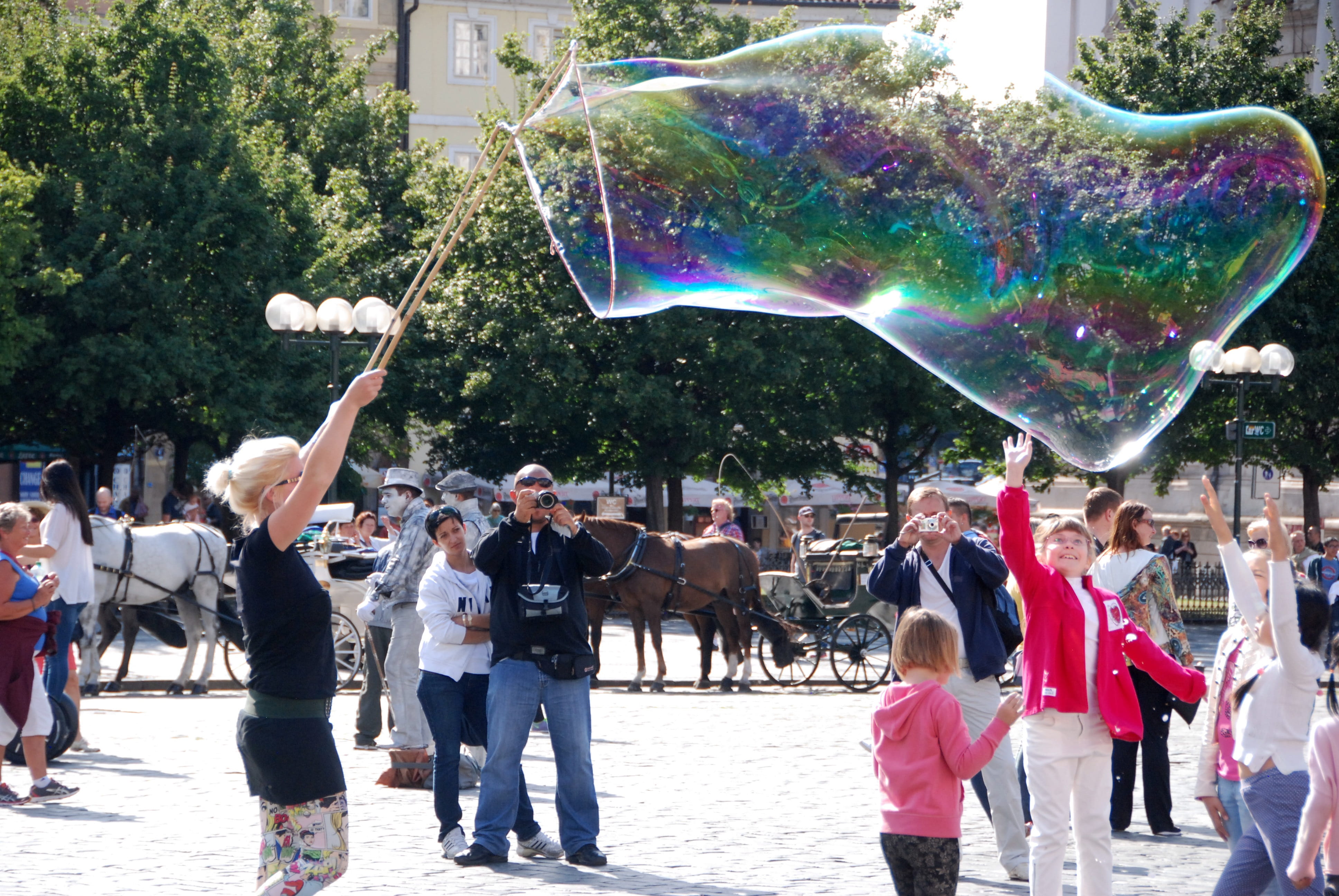 real people, bubble, built structure, multicolor, tree, woman, reflection, plant, human body part, street, men, tourist, enjoyment, large group of people, HD Wallpaper