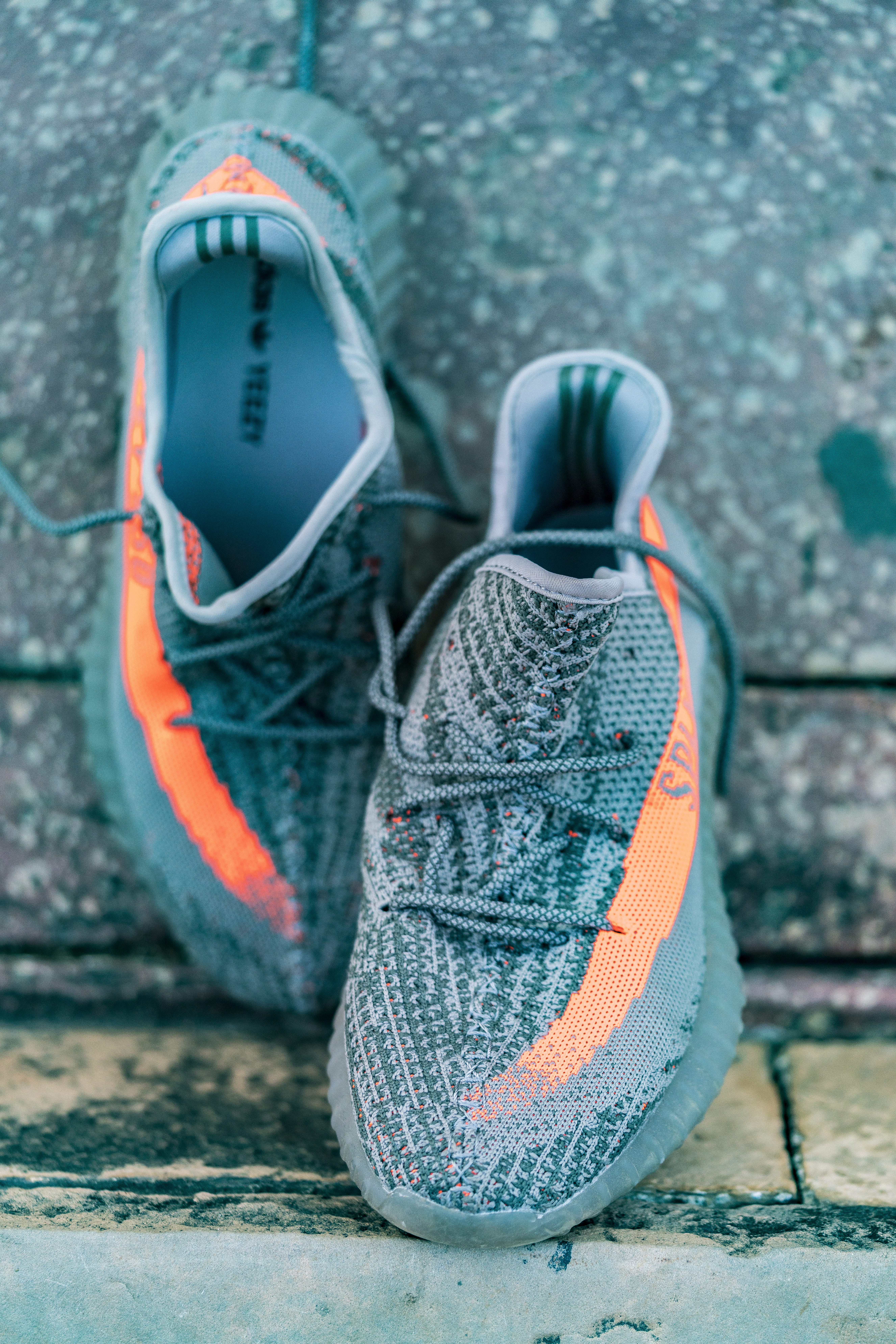 absence, wall - building feature, shoe, pair, street, architecture, yeezy, wall, sneakers, laces, color, close-up, safety equipment, outdoors, still life, Phone HD Wallpaper