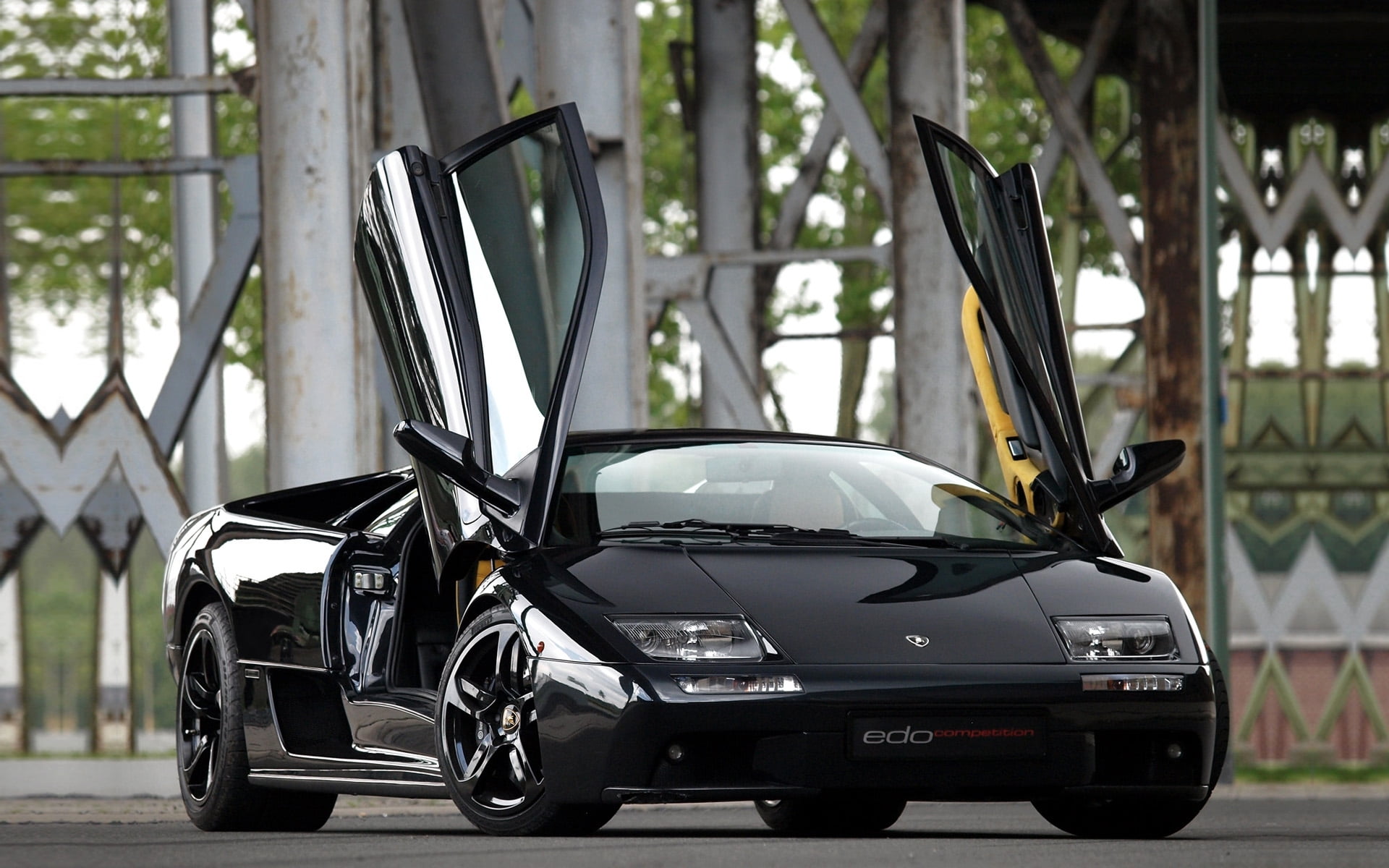 focus on foreground, drives, 1080P, black color, 6.0, city, silver colored, stationary, Lamborghini, Diablo, no people, parking, mode of transportation, HD Wallpaper