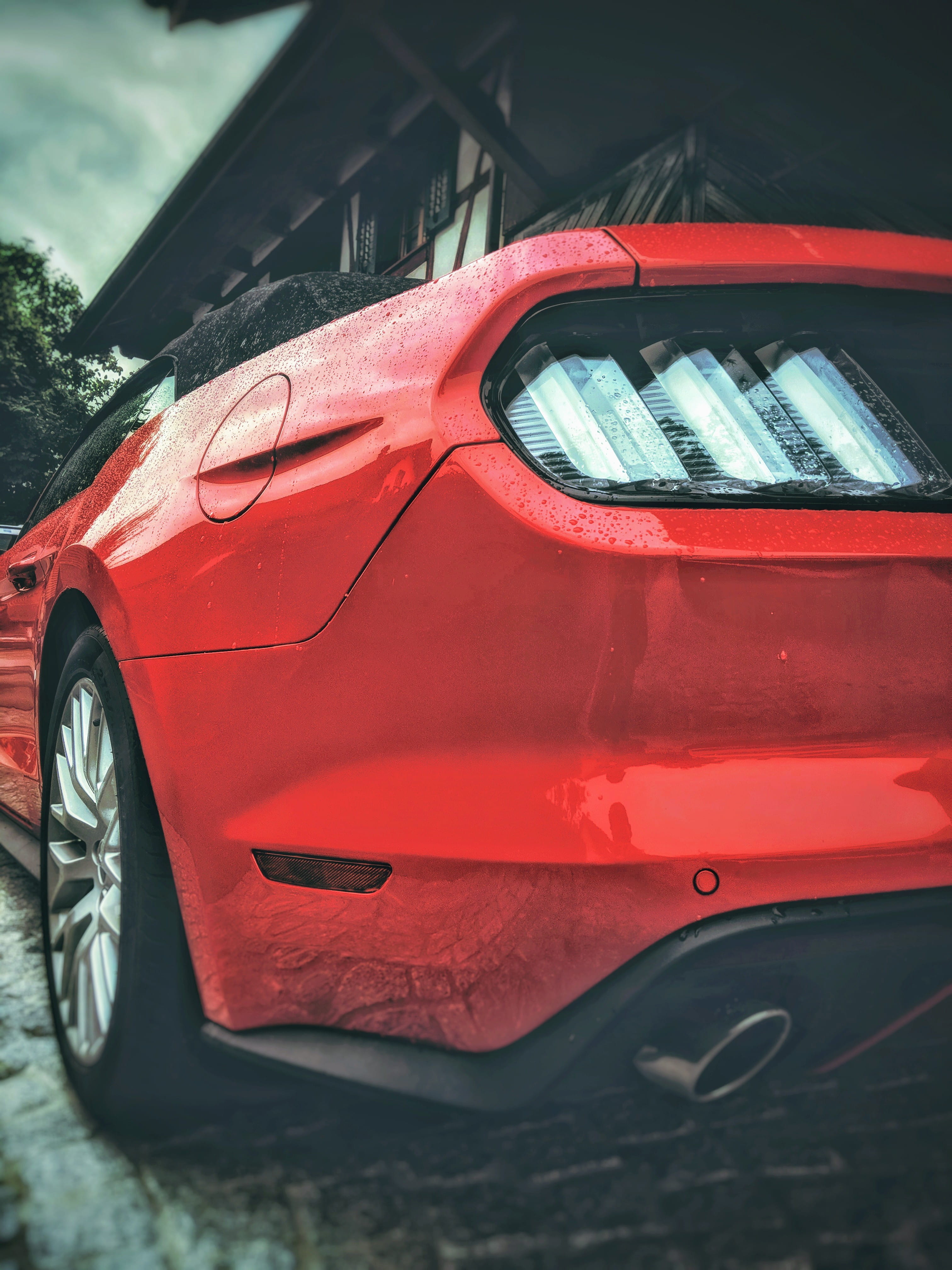 sports car, city, 4K, motor vehicle, reflection, wealth, street, outdoors, red, coupe, car mirror, mustang, focus on foreground, automobile, light, wheel, Phone HD Wallpaper
