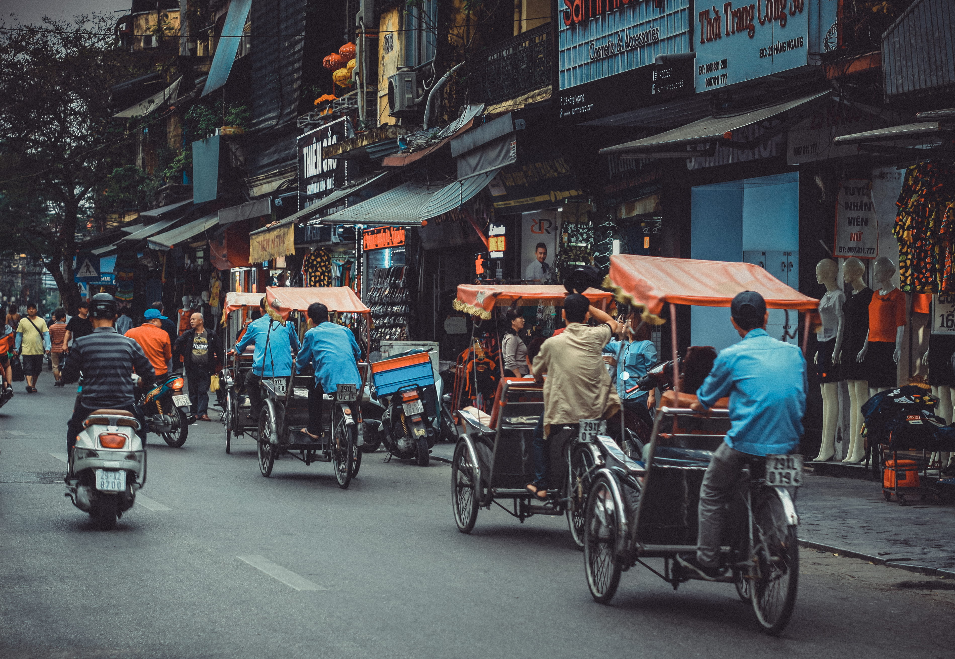 transportation, adult, people, daytime, street, riding, driving, 2K, motor, city life, city, city street, scooter, rear view, built structure, bikes, white, HD Wallpaper