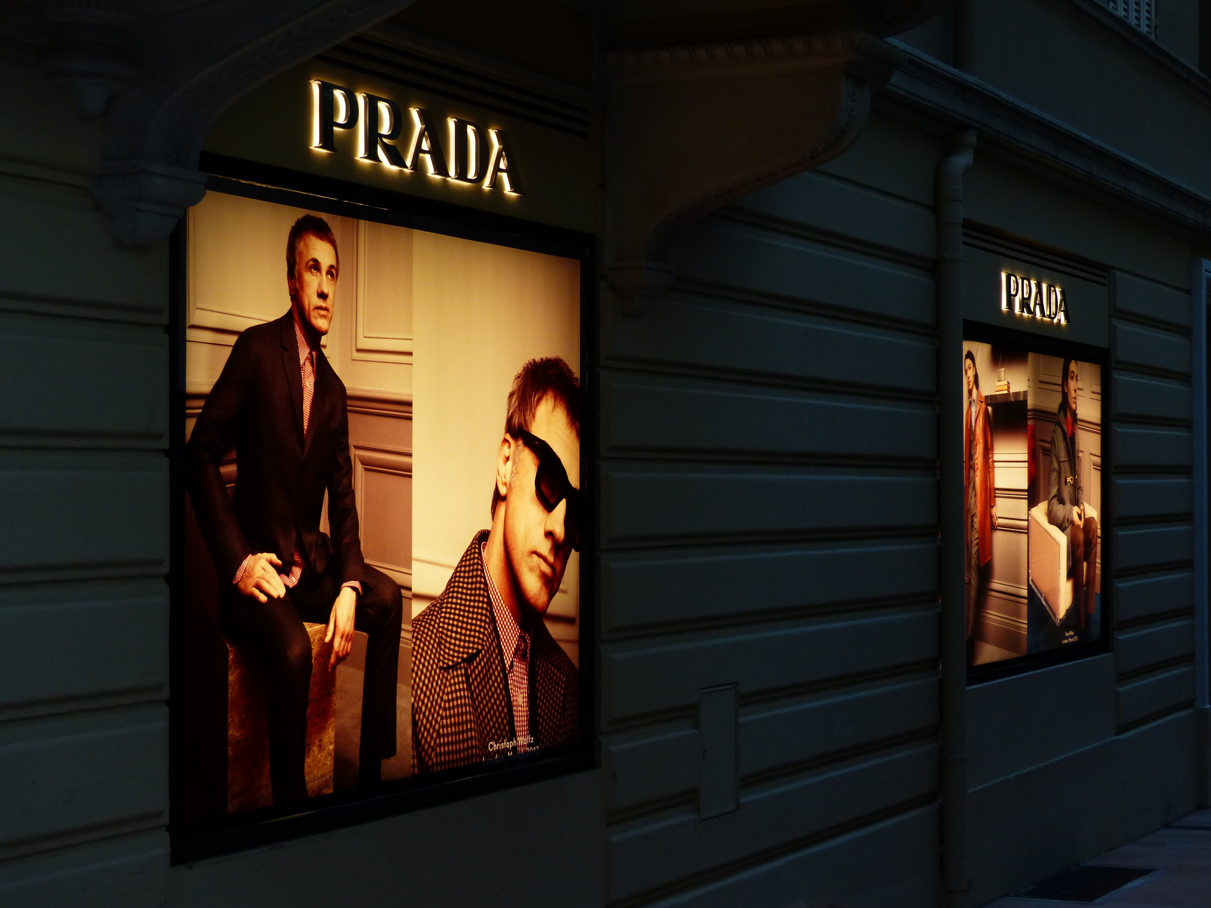 communication, text, sign, casual clothing, brand, man, outdoor advertising, women, billboard, prada, young women, advertising, building exterior, adult, HD Wallpaper