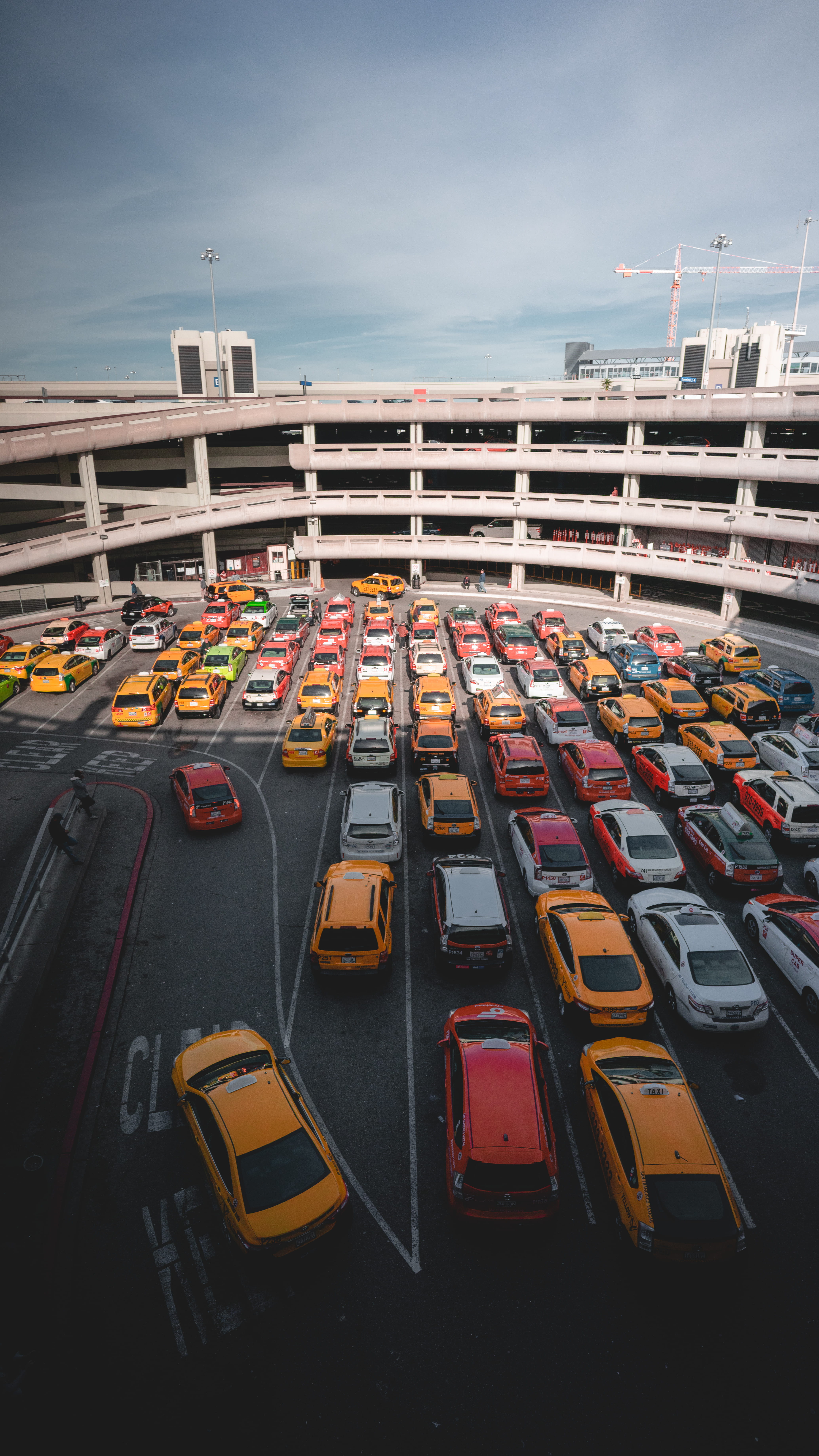 no people, cars, sfo, in a row, parking lot, line, building exterior, bus, motor vehicle, parked, parking garage, buildings, 5K, day, vehicle, architecture, Phone HD Wallpaper