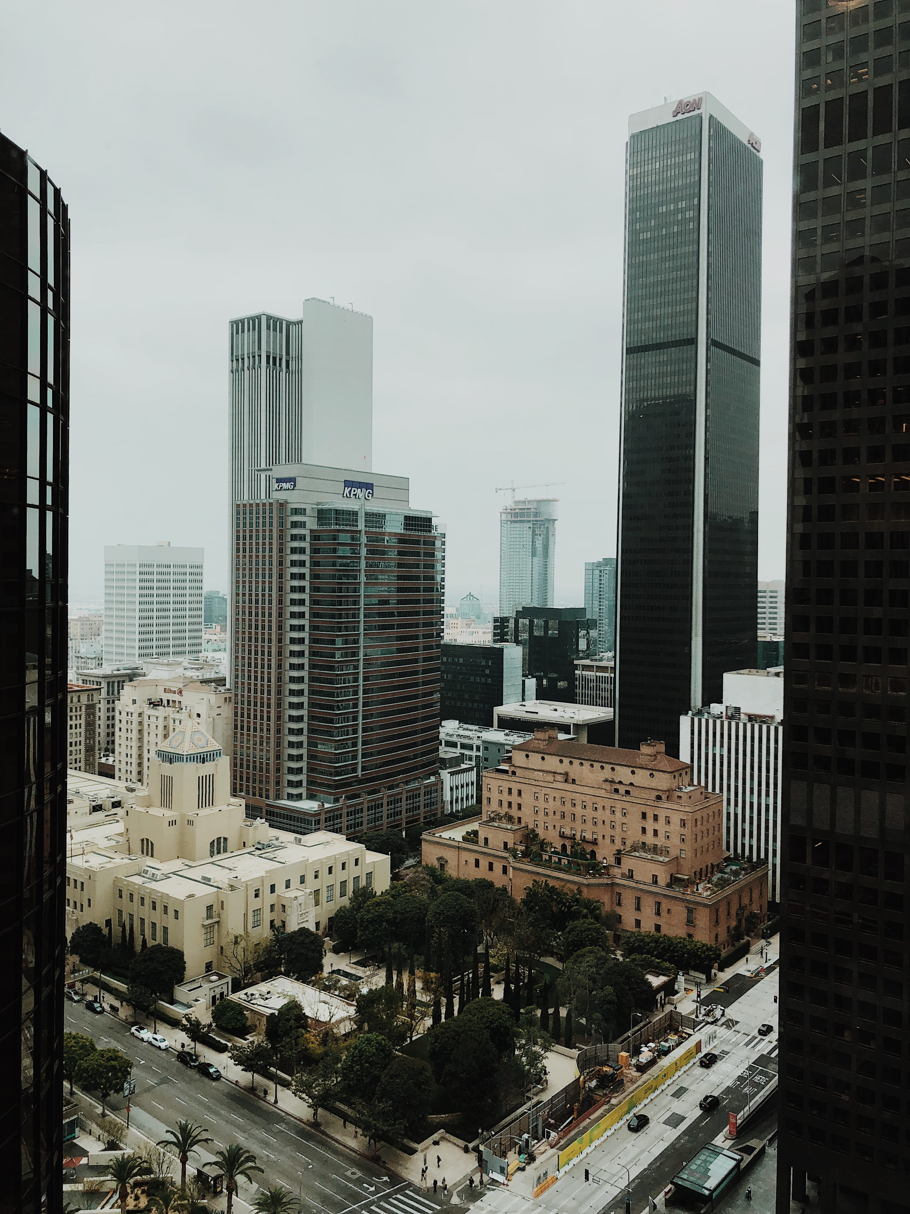 intersection, financial district, skyscraper, town, nature, sky, scenery, street, architecture, road, person, tall - high, day, building, 4K, tower, transportation, Phone HD Wallpaper