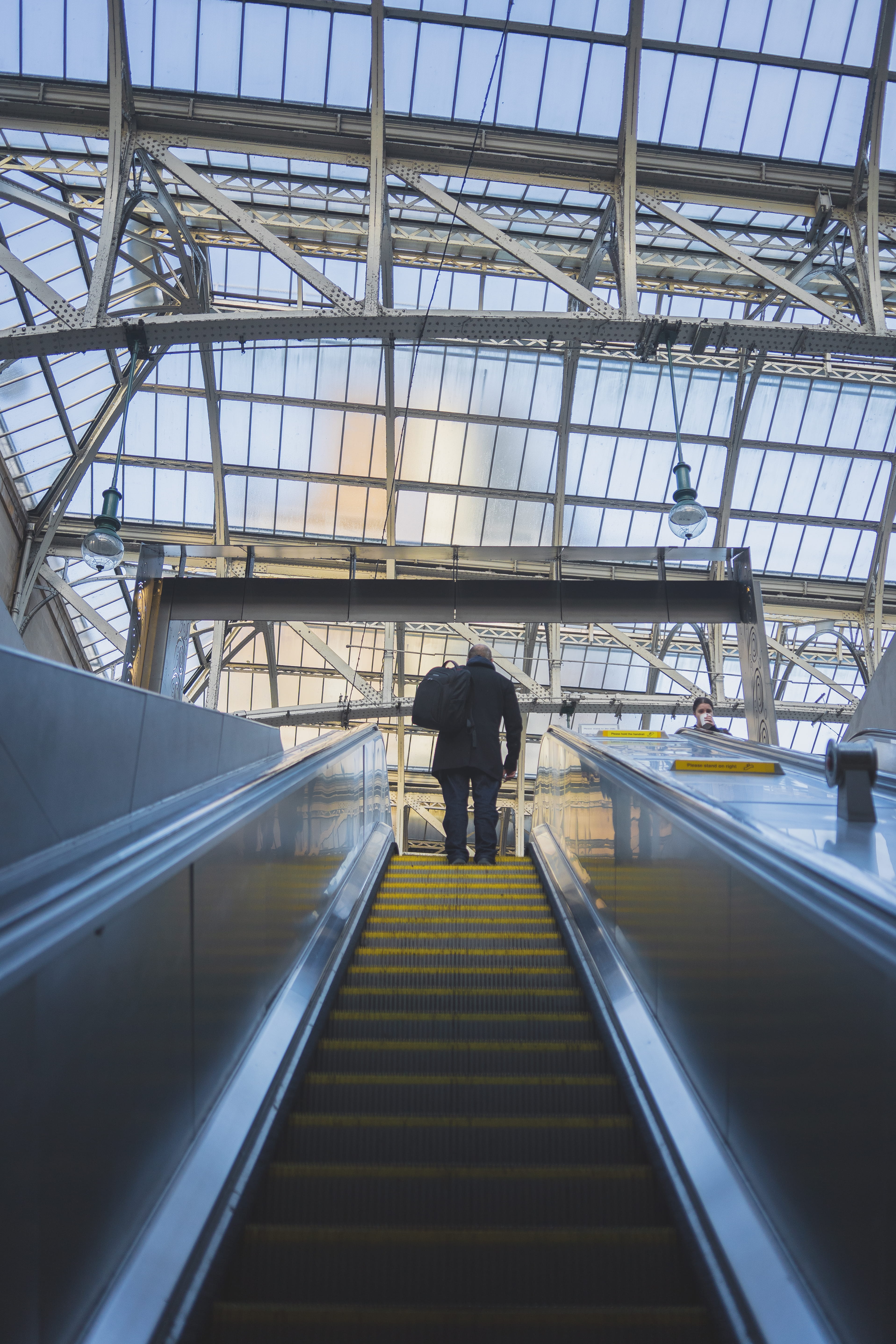 moving walkway, rear view, travel, walking, full length, the way forward, railing, window, steps and staircases, real people, human, built structure, man, Phone HD Wallpaper