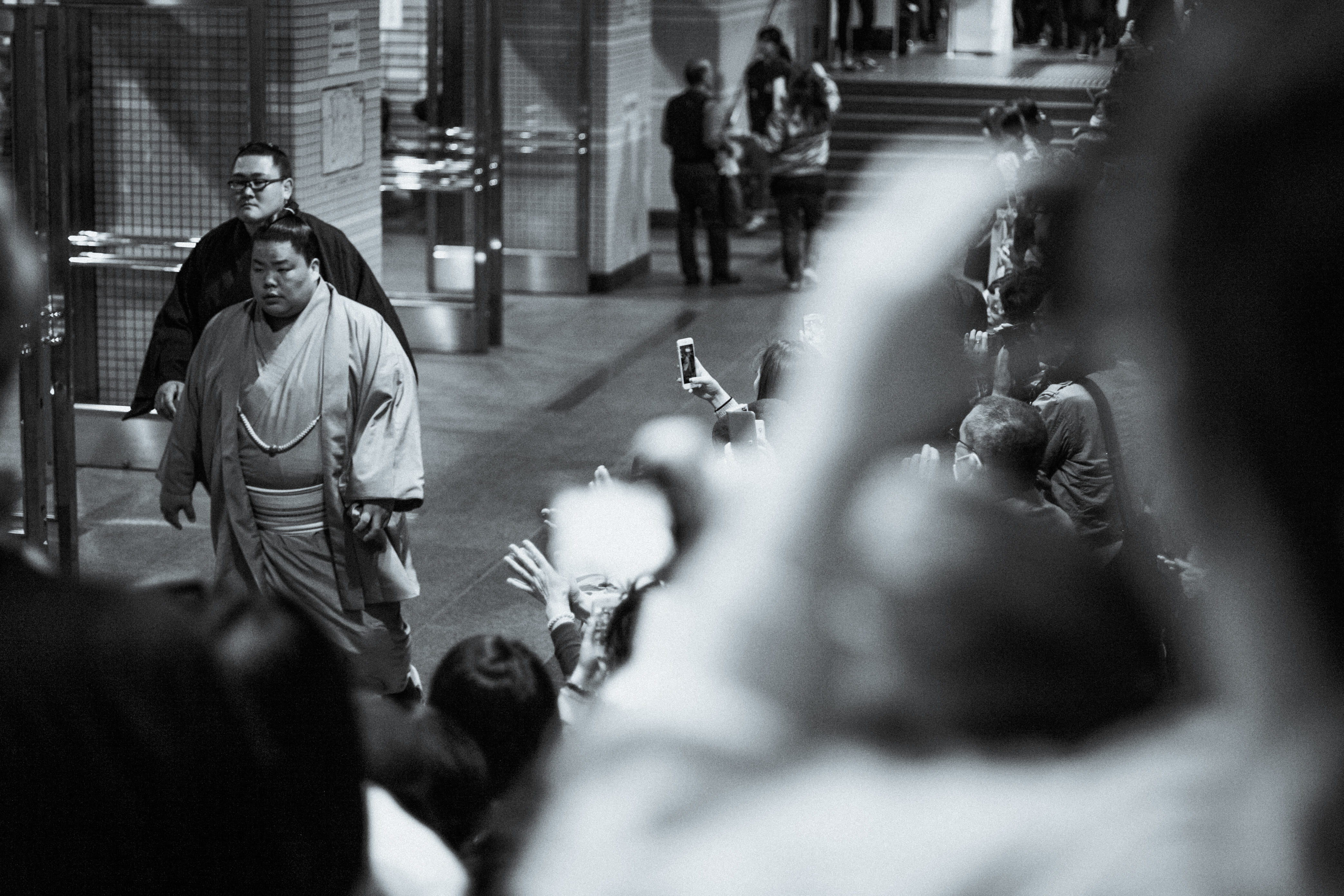 architecture, portrait, grayscale, real people, day, group of people, selective focus, subway, aisle, corridor, mammal, people, crowd, pedestrian, motion, HD Wallpaper
