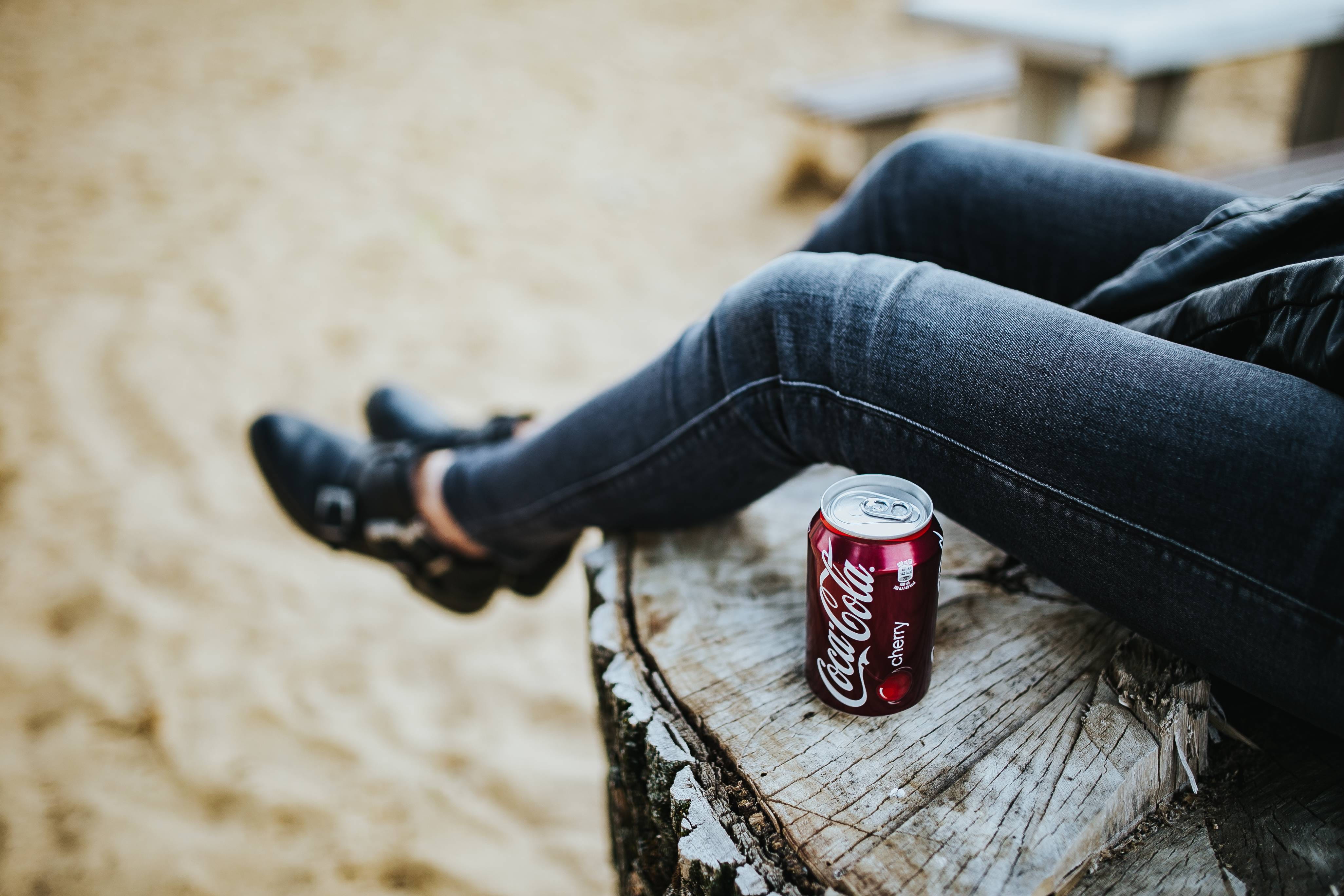 container, tree, one person, bottle, 4K, leisure activity, tree stump, lying down, relaxing, coke, woman, blonde, female, outdoors, real people, text, HD Wallpaper