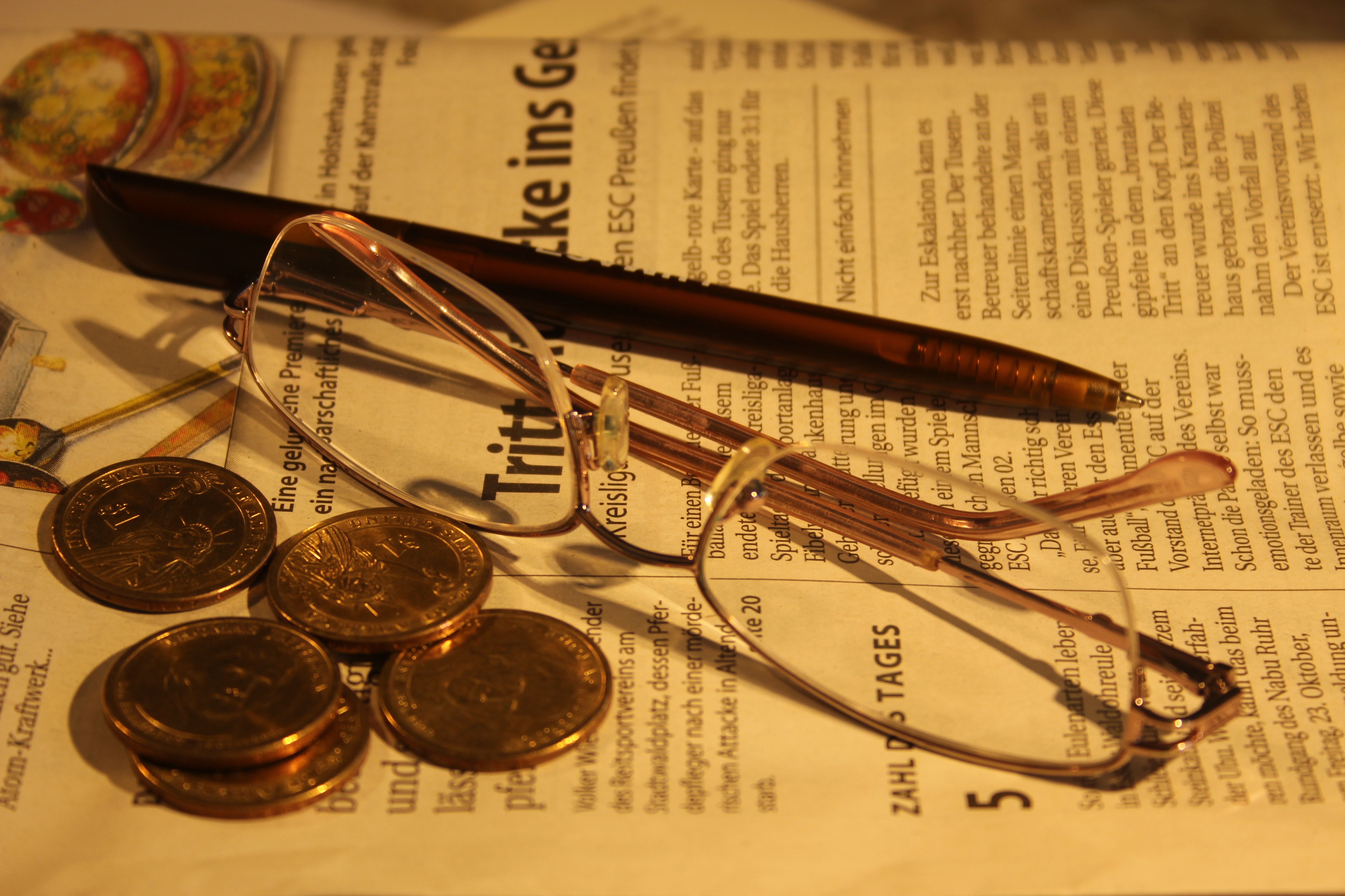 indoors, writing instrument, publication, finance, paper, daily, table, colored, no people, eyeglasses, pen, still life, high angle view, business, money, HD Wallpaper