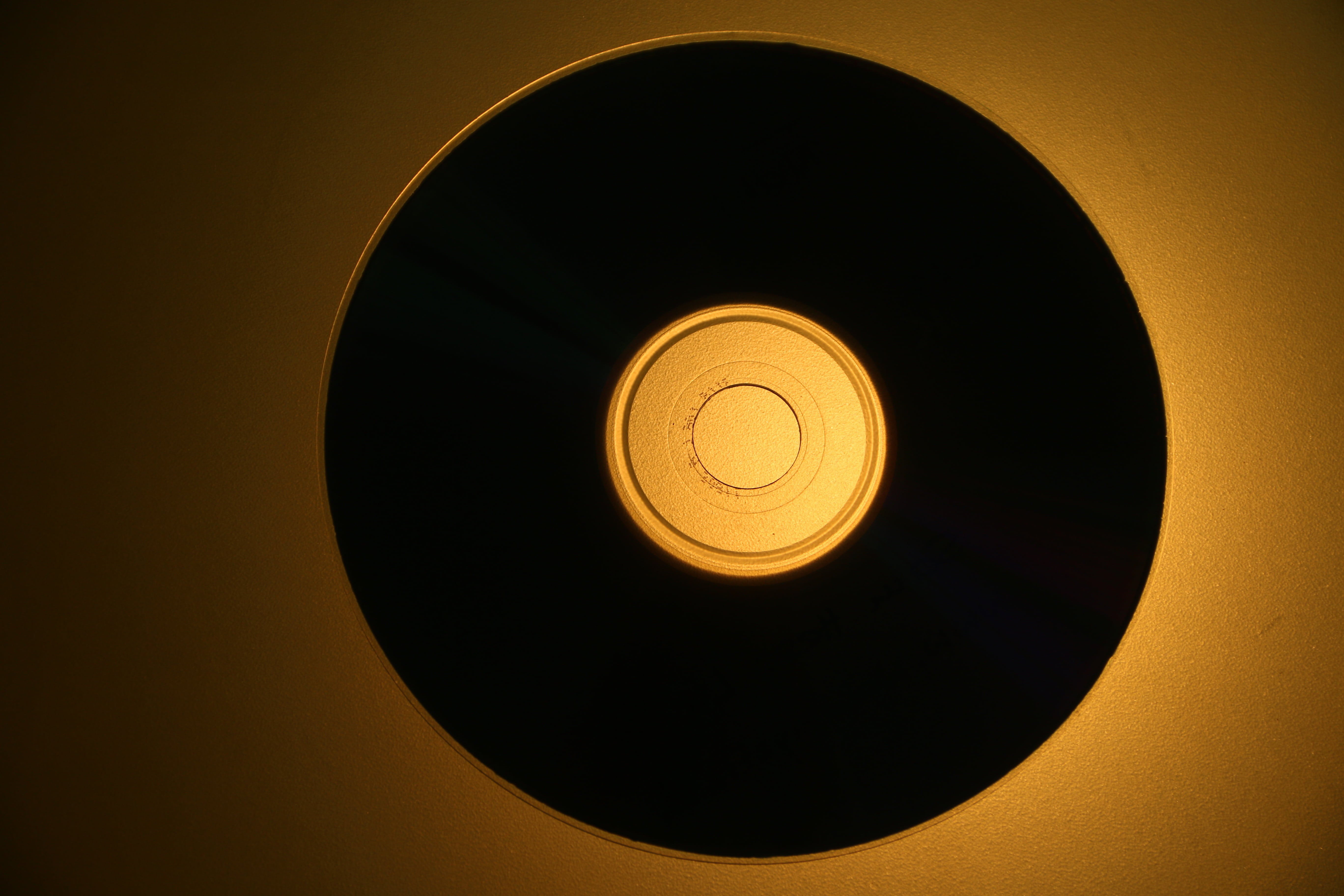 shape, dark, glowing, illuminated, night, directly above, no people, music, hole, 5K, circle, gold colored, play, geometric shape, indoors, black color, HD Wallpaper