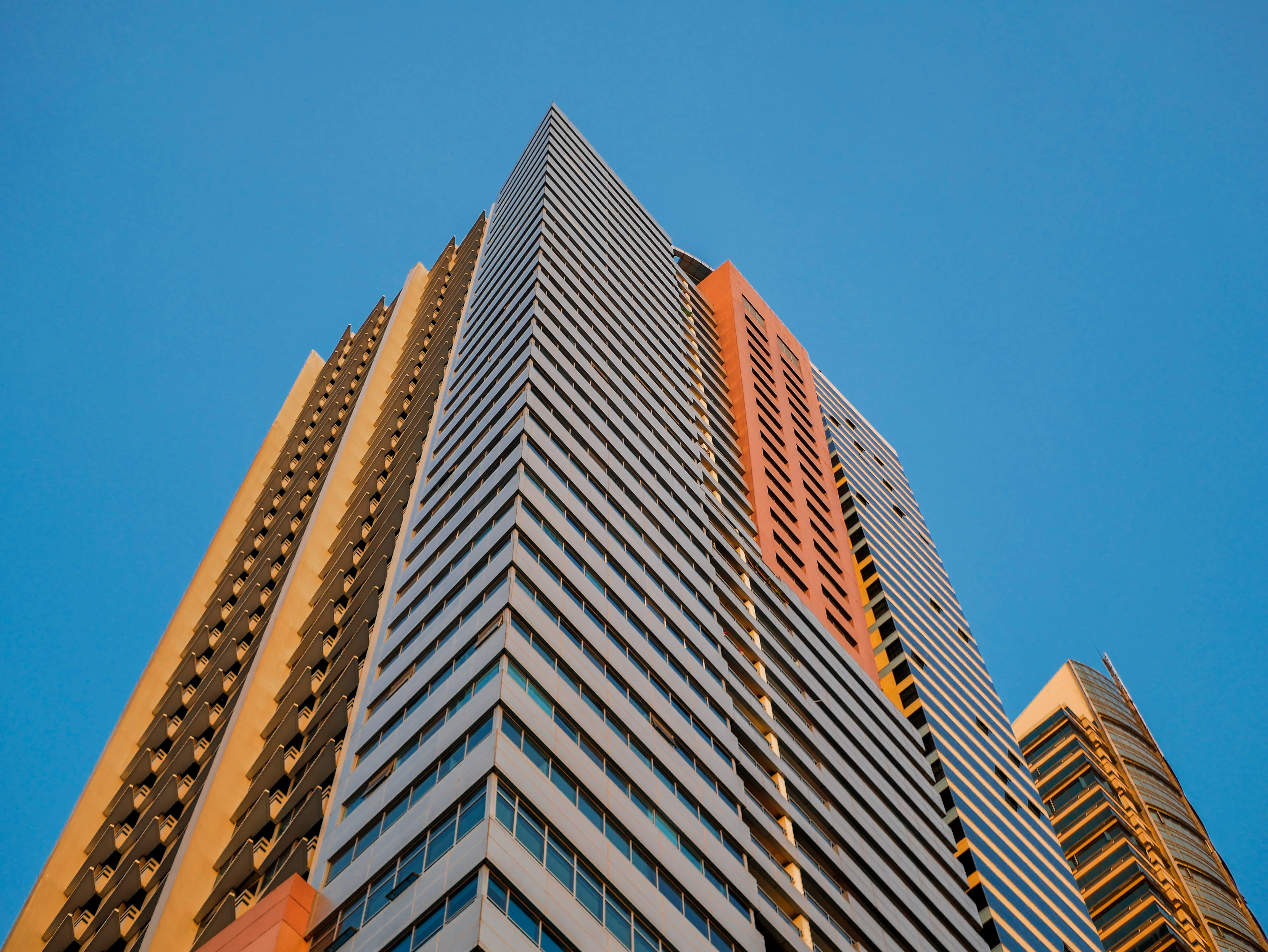 tower, tall - high, architecture, office, building exterior, town, blue, building, orange, view, apartment exterior, skyscraper, built structure, outdoors, HD Wallpaper