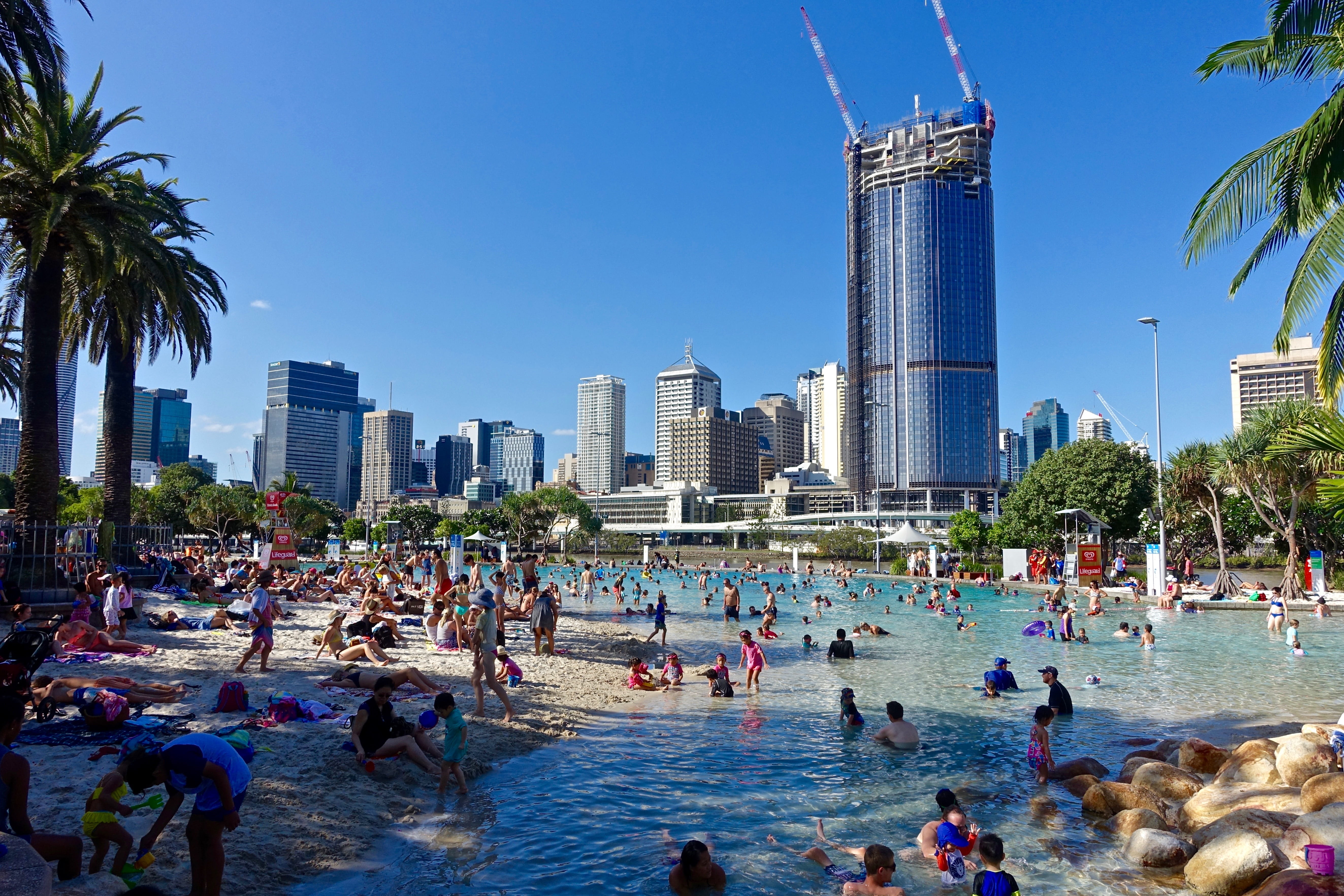 sky, group of people, water, vacations, skyscraper, city, blue, swimmers, near, crowd, tall - high, 5K, building exterior, holiday, building, architecture, HD Wallpaper