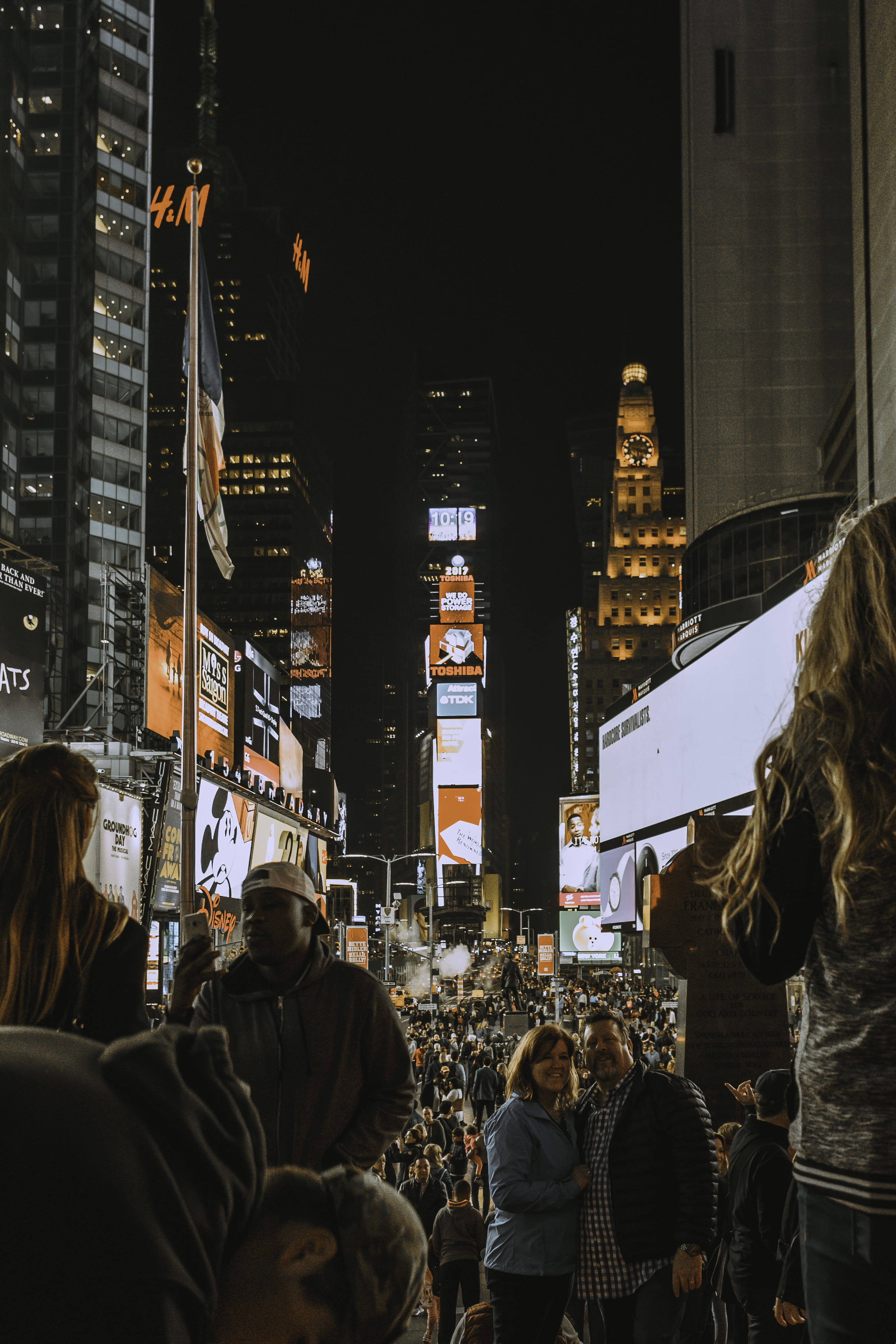 lifestyles, sony, sony a7r, skyscraper, disney, united states, adult, night, group of people, office building exterior, built structure, street, raw, theater district, Phone HD Wallpaper