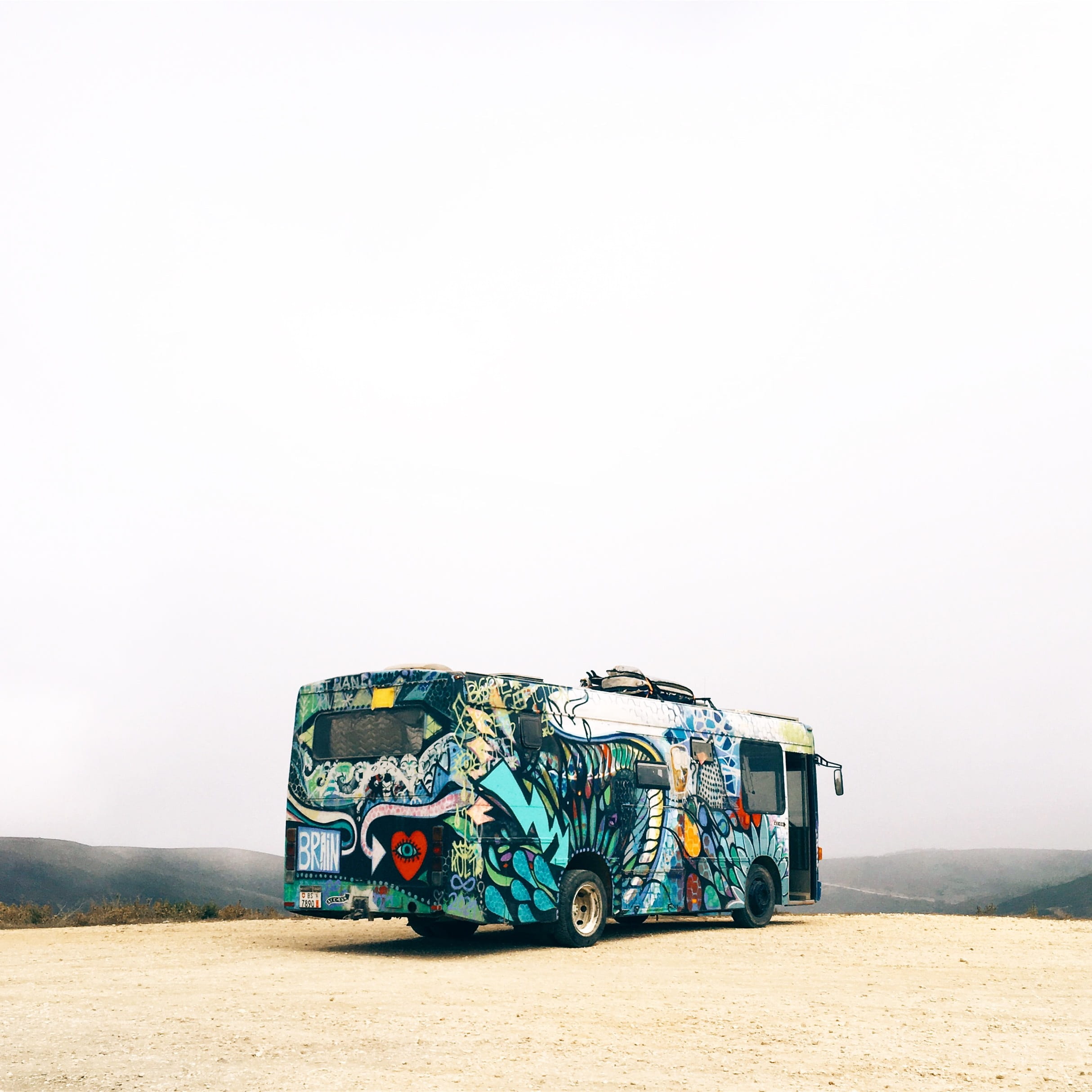 parking, land, 1080P, graffiti, travel, multi colored, motor vehicle, off-road vehicle, tranportation, car, sky, road, land vehicle, vehicle, bus, creativity, Phone HD Wallpaper