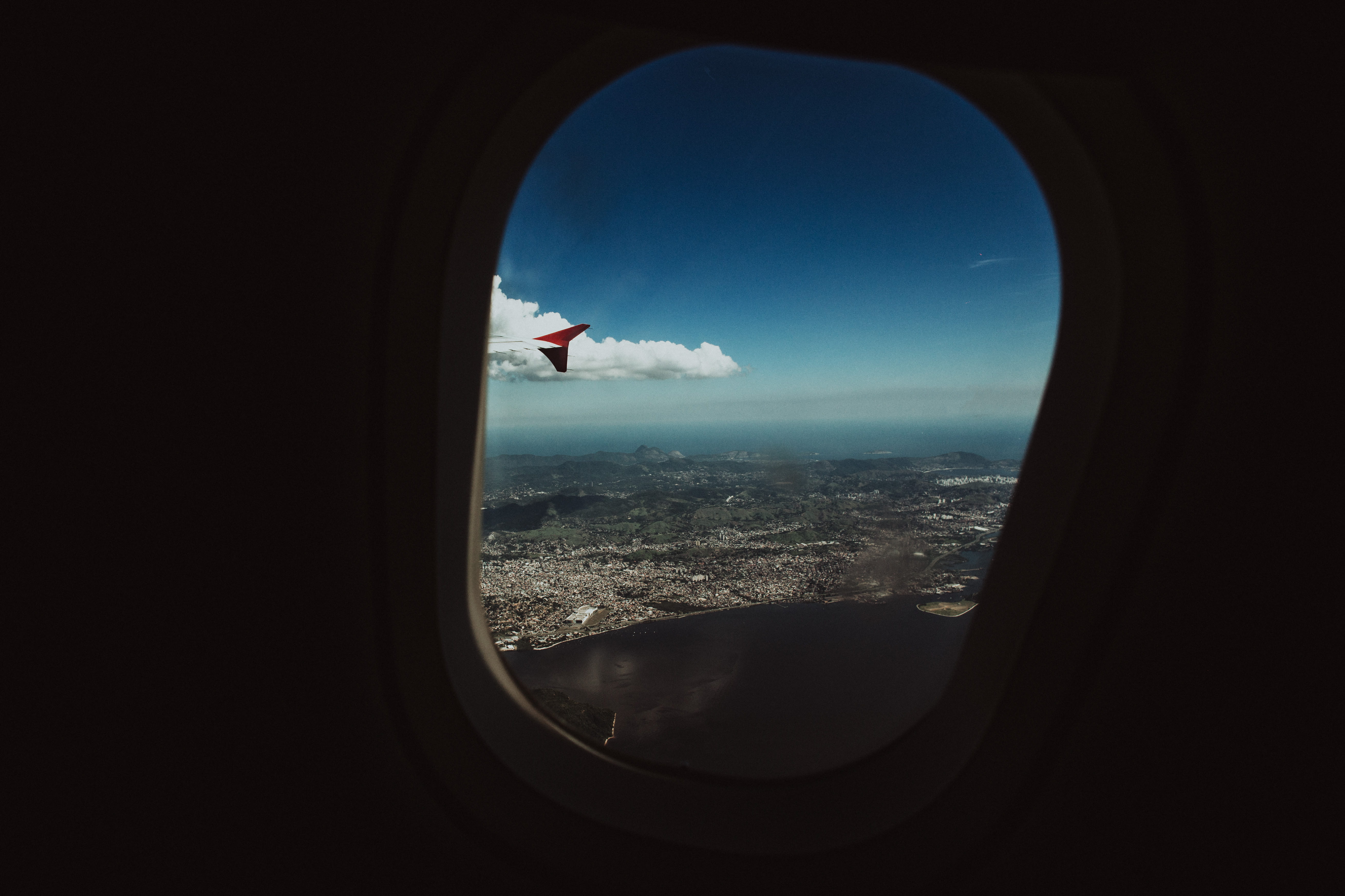 flying, nature, day, mode of transportation, window, sea, cityscape, transportation, sky, hole, architecture, flare, aircraft, glass - material, one person, HD Wallpaper