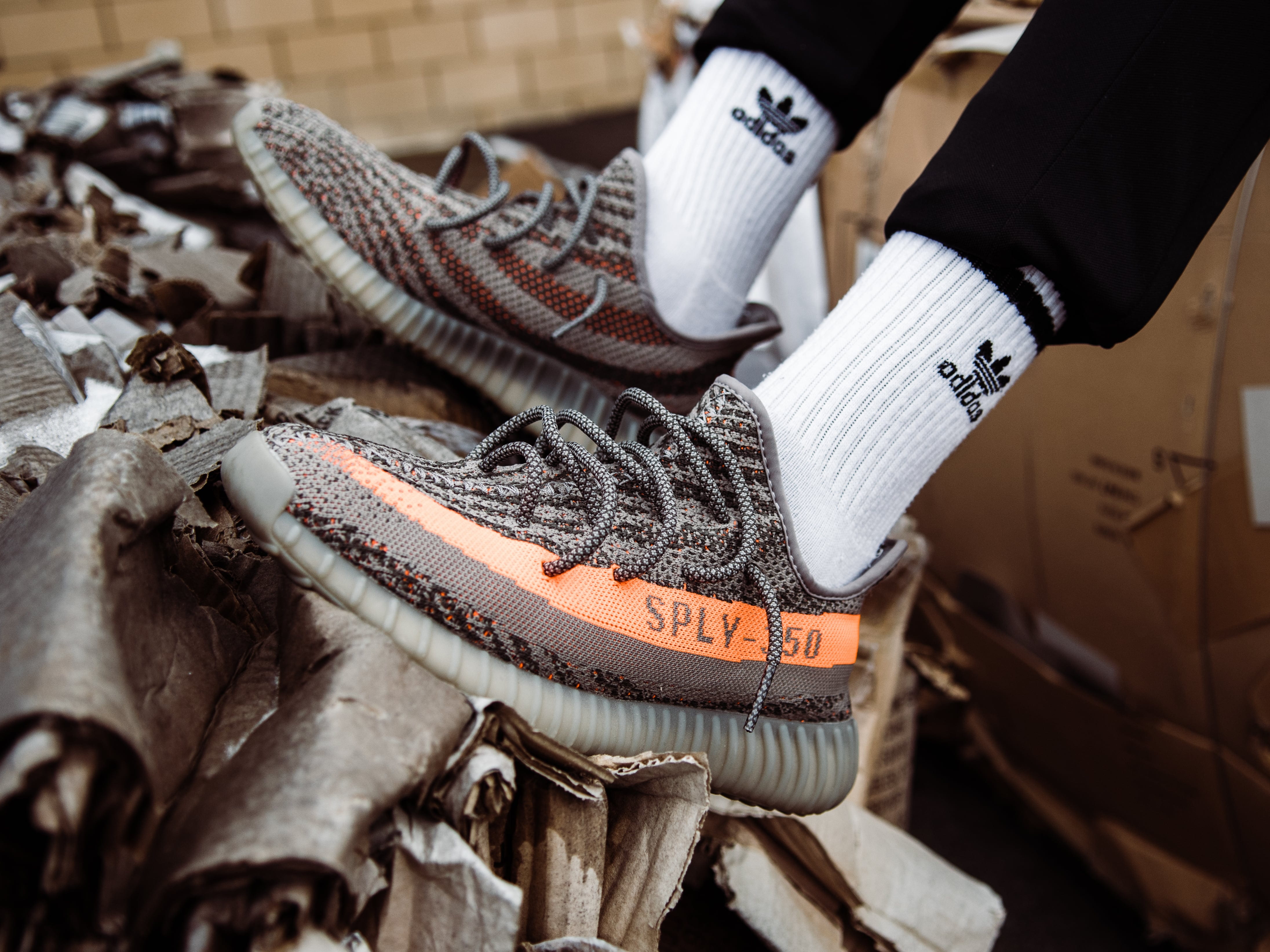 indoors, protective glove, shoe, one person, wood - material, person, v, human hand, sock, white, selective focus, adidas, wearing, textile, orange, business, HD Wallpaper