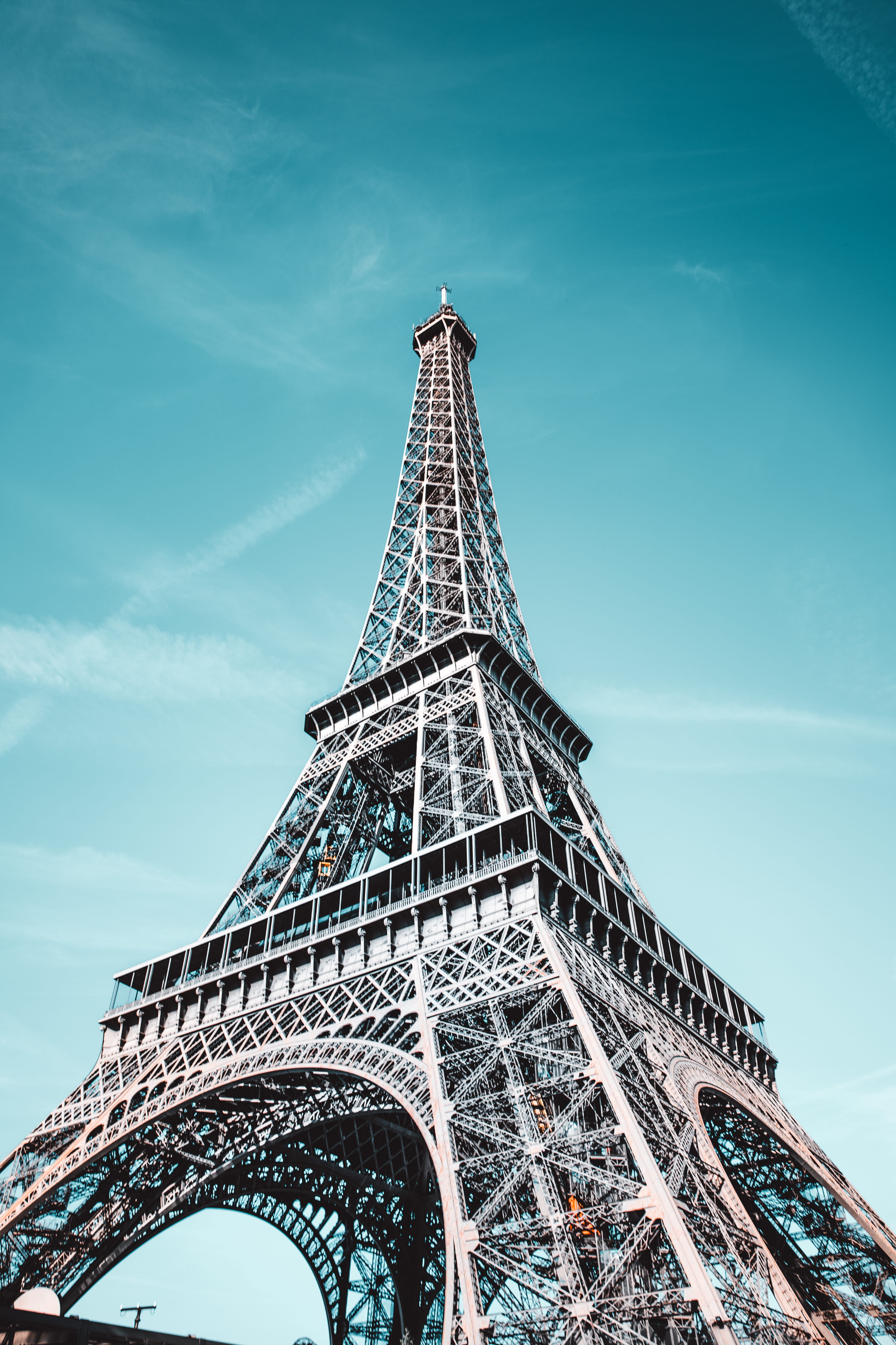 daytime, cityscape, tall - high, sight, metal, high, day, outdoors, no people, building, architectural feature, eiffel tower, low angle photography, tourism, Phone HD Wallpaper