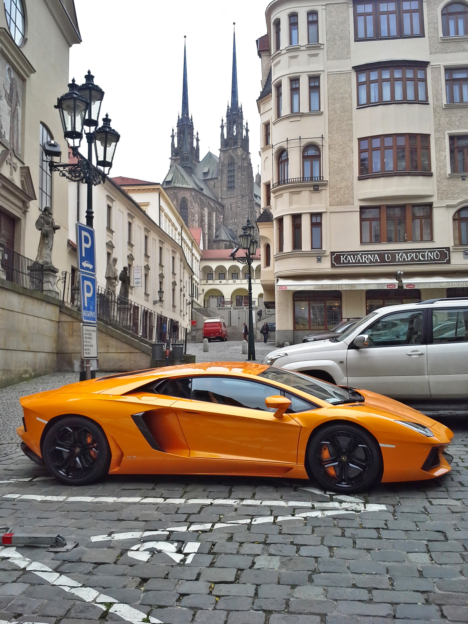 lamborghini, mode of transportation, sports, motion, residential district, city, automobiles, building exterior, orange, power, building, street, transportation, Phone HD Wallpaper