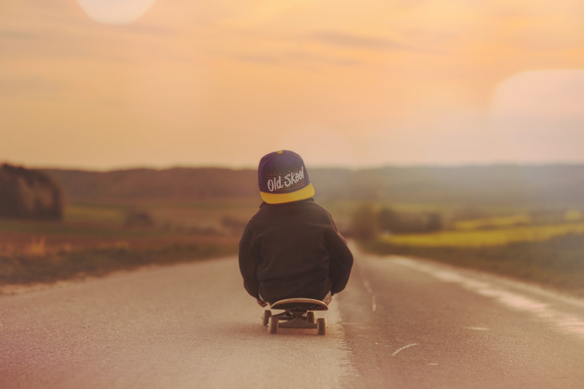 clothing, 1080P, men, lifestyles, skateboard, focus on foreground, full length, hat, rear view, real people, road, sunset, one person, sky, transportation, HD Wallpaper