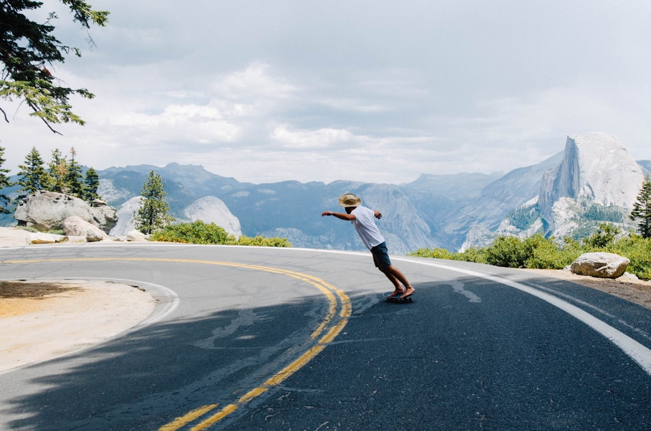 leisure activity, the way forward, standing, one person, sky, road, day, real people, scenics - nature, casual clothing, mountains, skateboarding, nature, HD Wallpaper