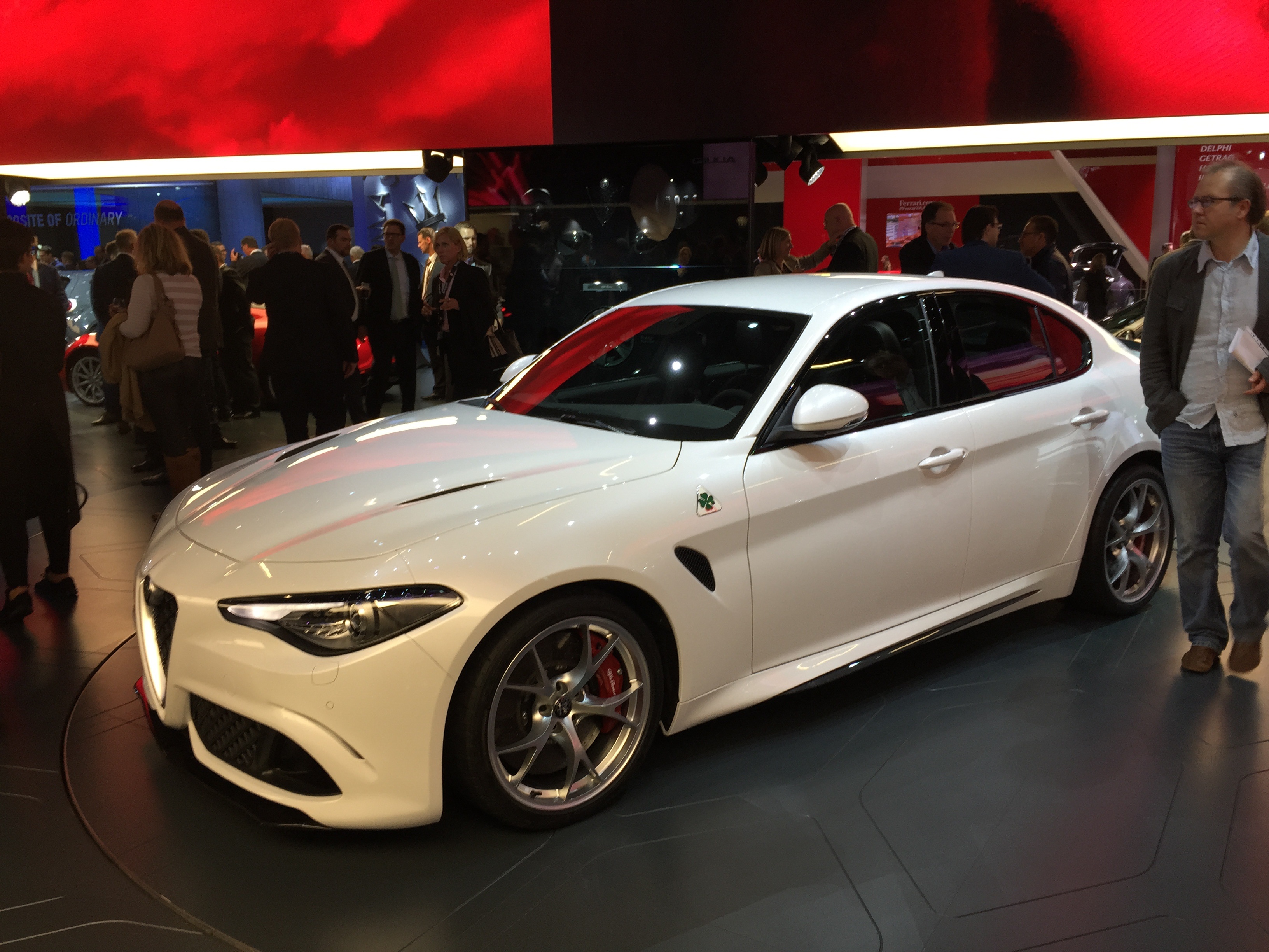lifestyles, men, white, showroom, red, quadrifoglio verde, auto, dynamic, mittelklasse, alfa romeo, sportscar, 2K, giulia, motor vehicle, group of people, HD Wallpaper