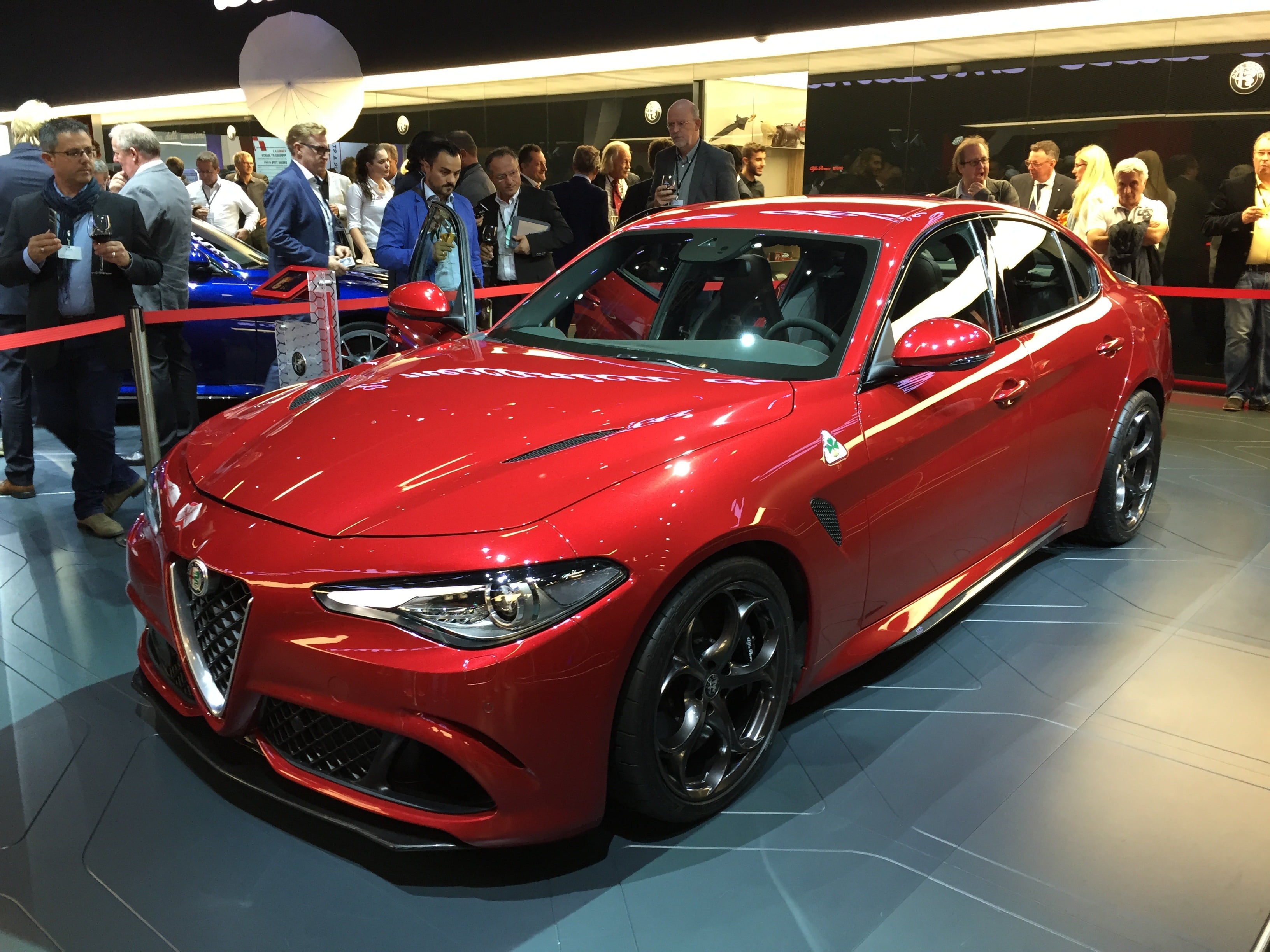 sporty, italy, 2K, premium, men, alfa romeo, giulia, city, dynamic, fast, milan, showroom, retail, red, land vehicle, motor vehicle, people, modern, mode of transportation, HD Wallpaper