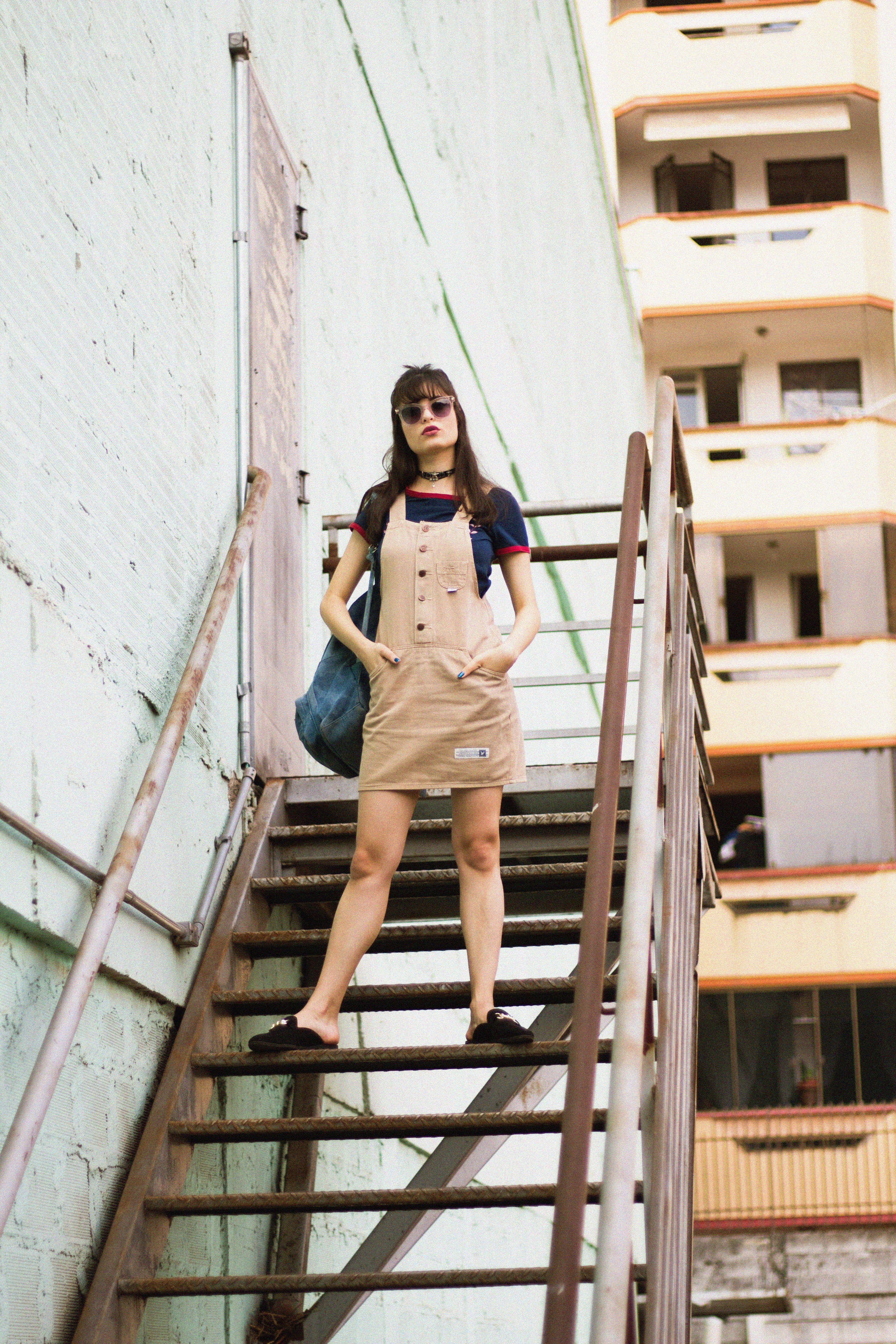 dungaree, hairstyle, caucasian, outdoors, brown, young women, street, architecture, beside, full length, portrait, stairs, beautiful woman, one person, Phone HD Wallpaper