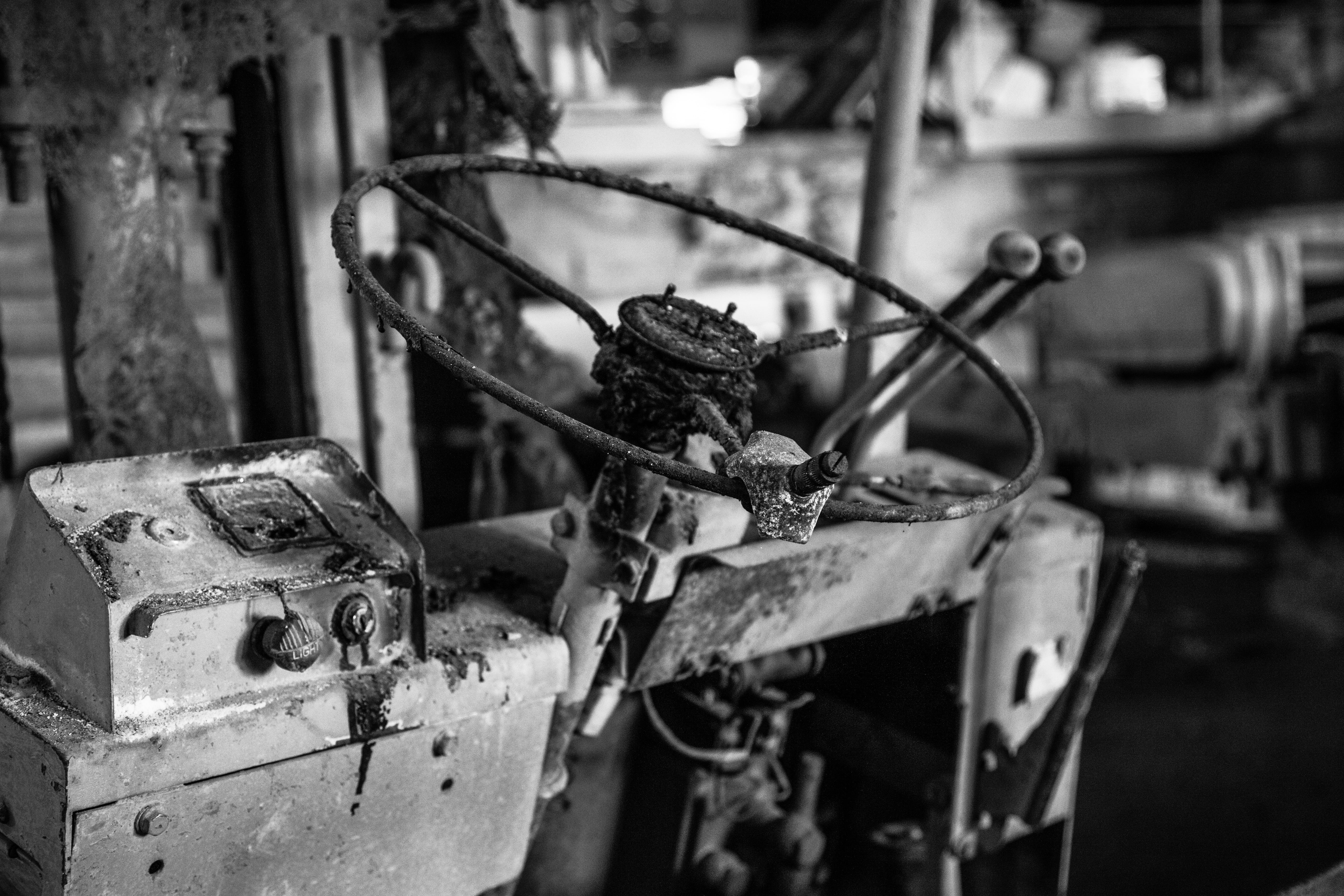 old, run-down, transportation, black and white, wheel, iron, focus on foreground, weathered, steering, control, old factory, damaged, 5K, retro Styled, HD Wallpaper