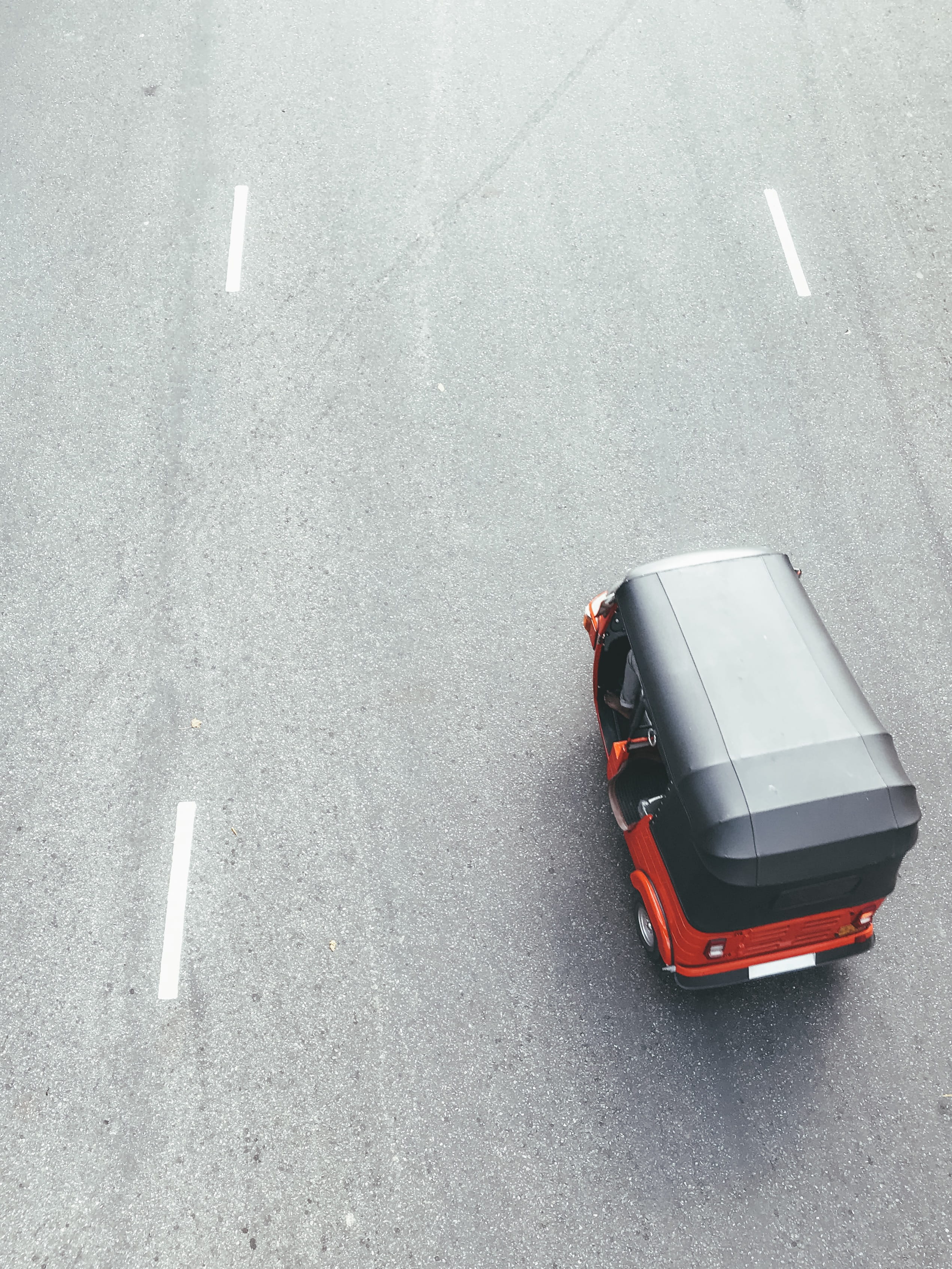 slope, spoke, wheel, dirt road, land vehicle, white color, 2K, car, high angle view, no people, day, black, red, van, street, sign, automobile, caravan, Phone HD Wallpaper