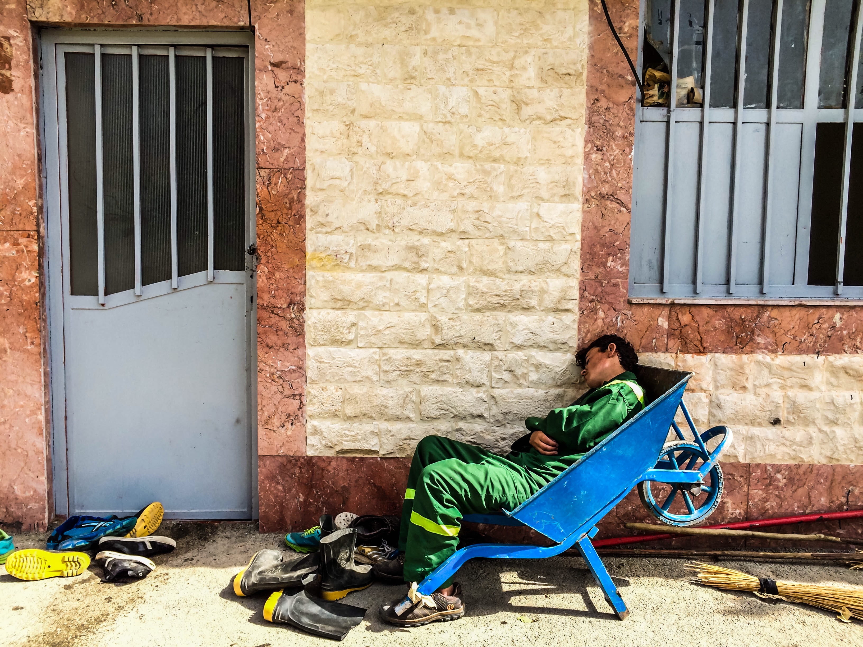 clothing, architecture, sitting, street, sleeping, wheelbarrow, building, social issues, hopelessness, vehicle, residential district, wall - building feature, HD Wallpaper