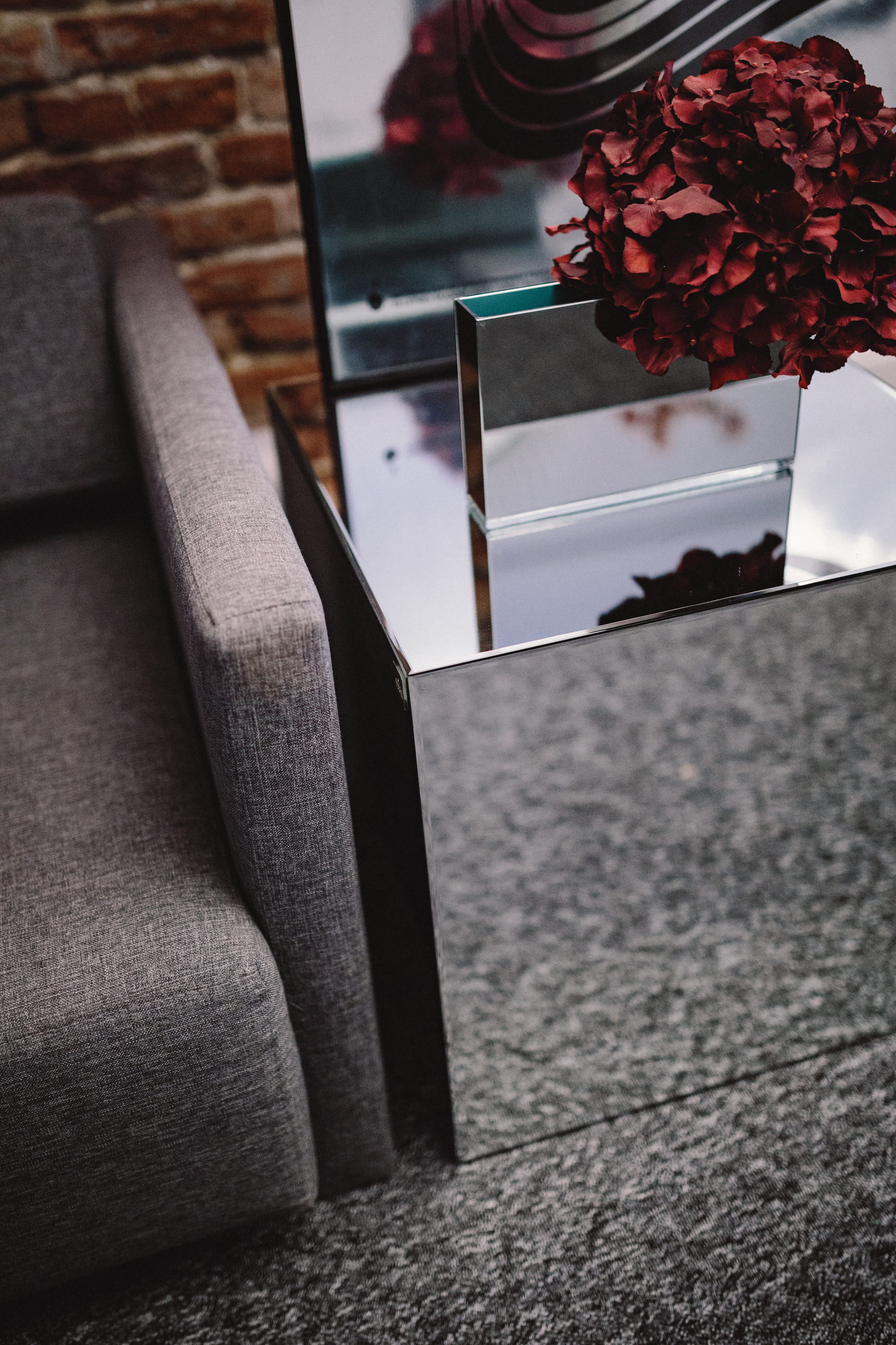 home Interior, coffee, furniture, Coffee Table, simple, flowering plant, brick wall, precious gem, indoors, minimalism, book, selective focus, mirrored coffee table, Phone HD Wallpaper