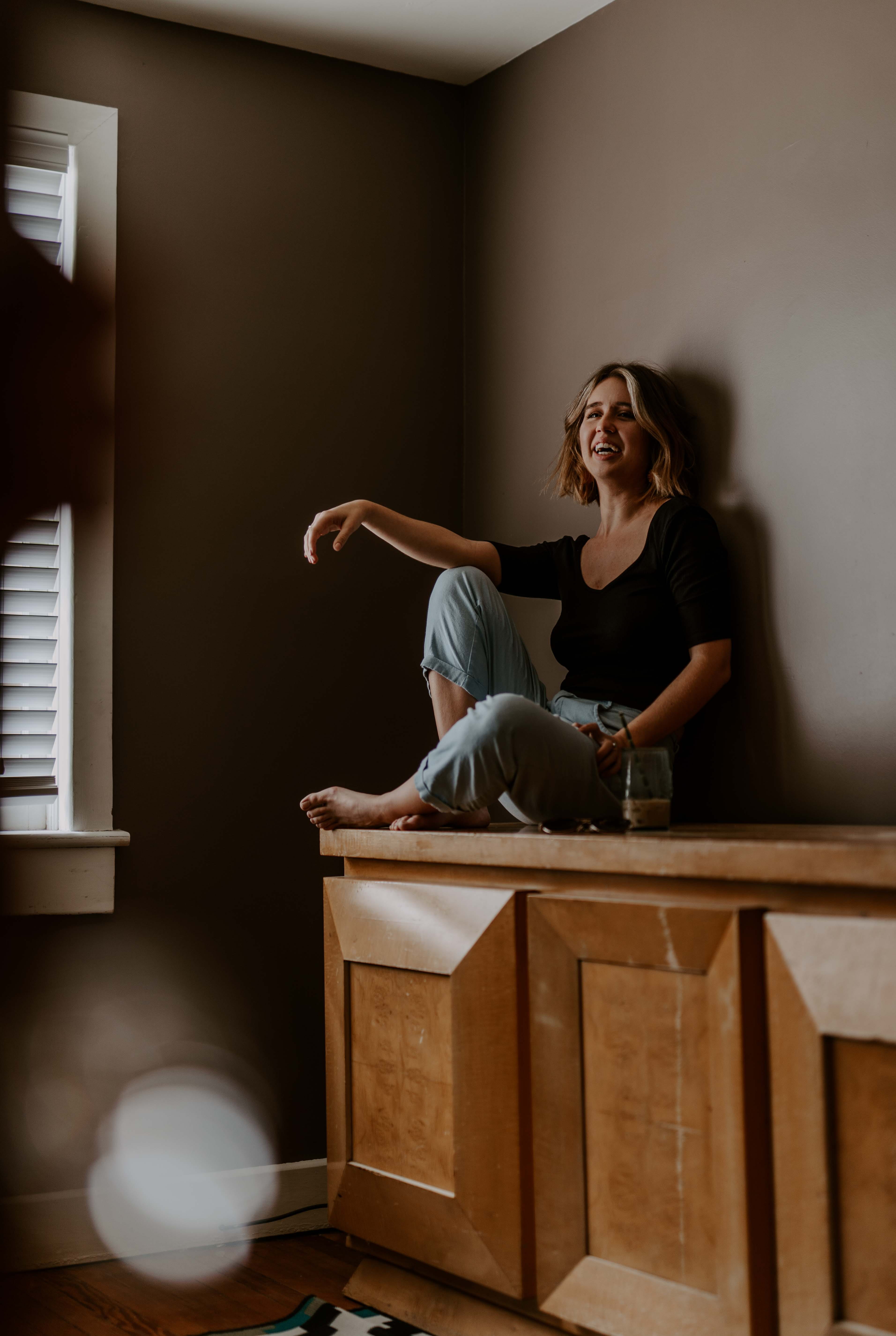 young adult, fashion photography, plywood, domestic room, furniture, home decor, lifestyles, home interior, laughing girl, hairstyle, sideboard, flooring, Phone HD Wallpaper